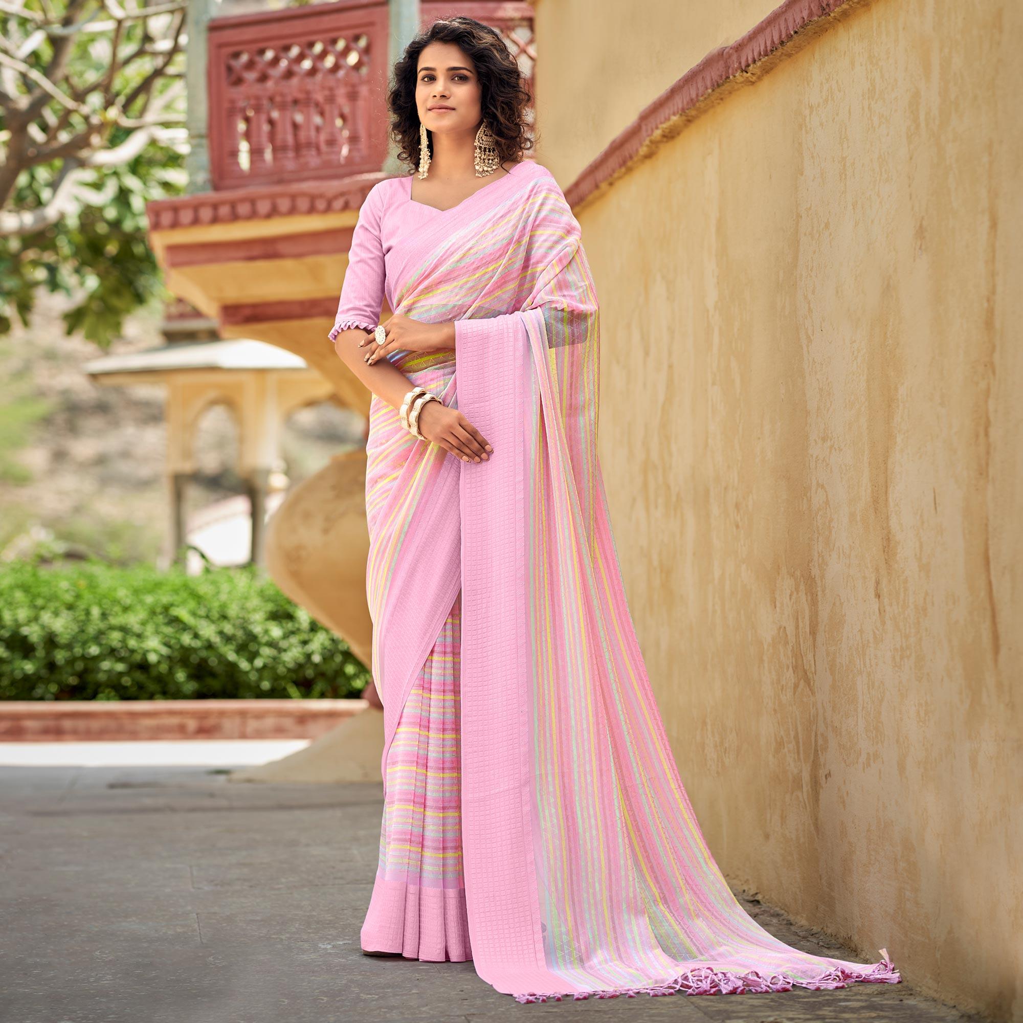 Pink Printed Georgette Saree With Tassels - Peachmode