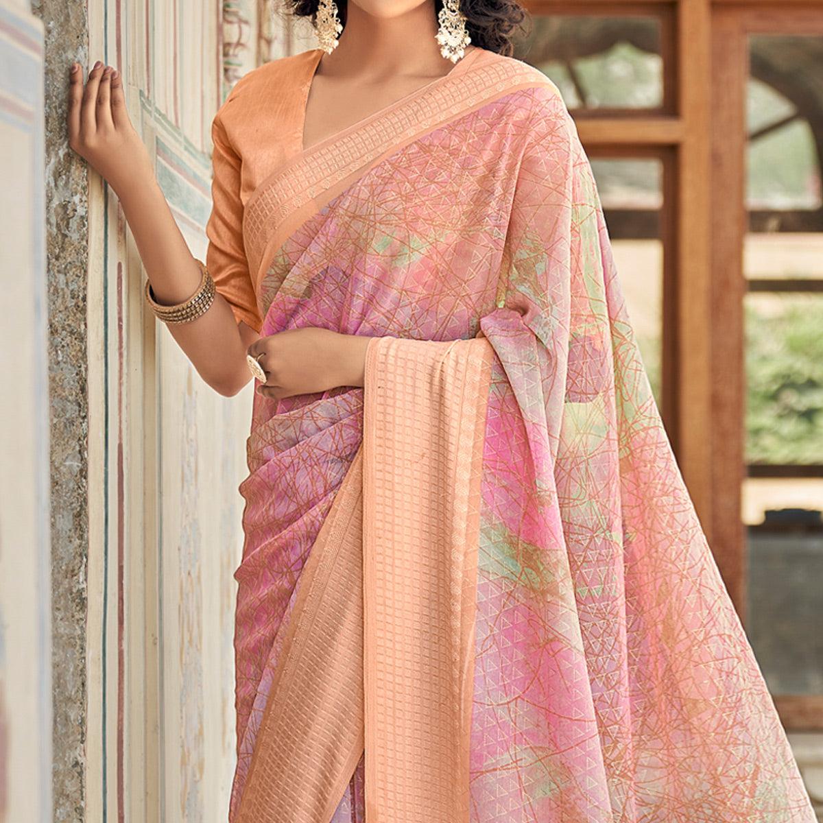 Pink Printed Georgette Saree With Tassels - Peachmode