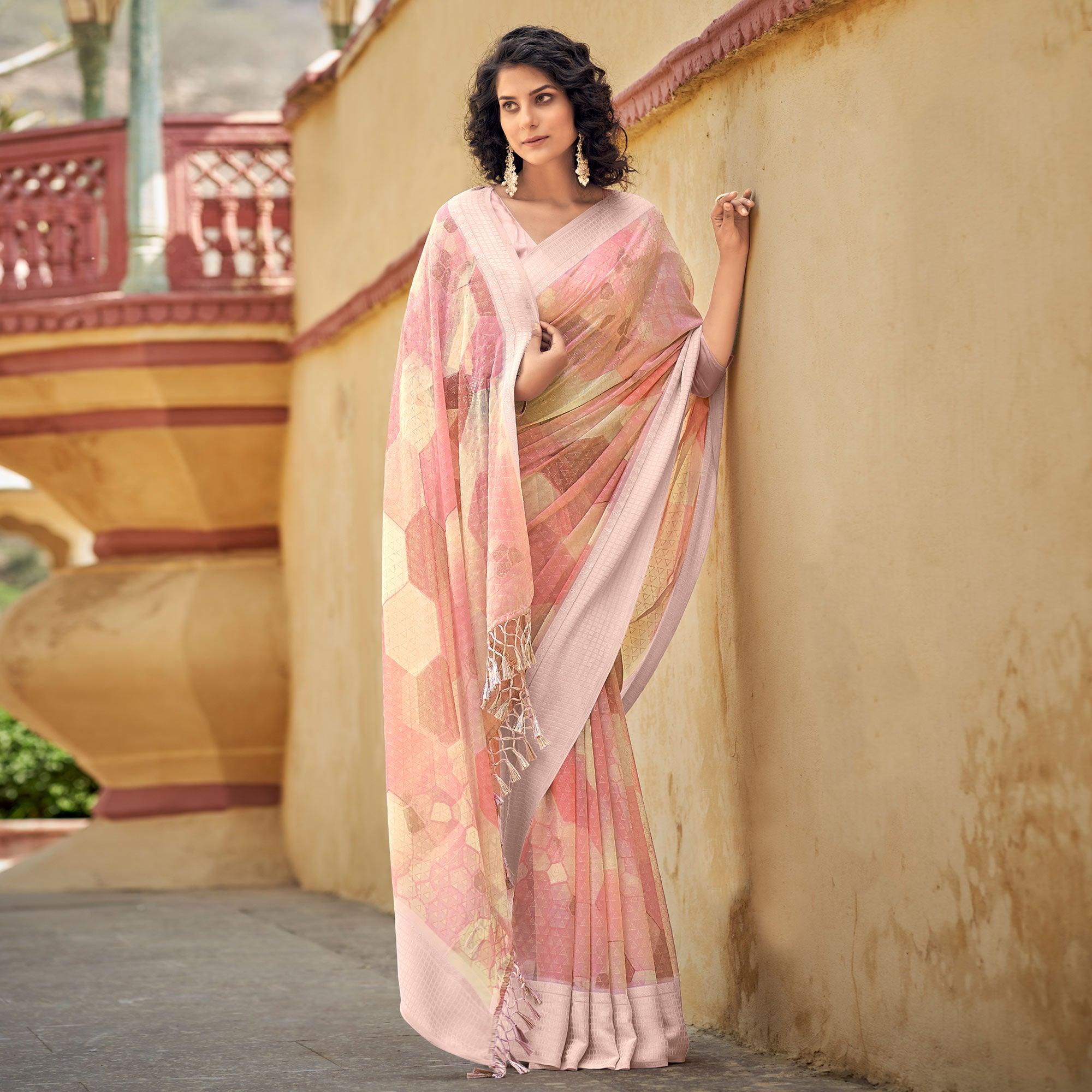Pink Printed Georgette Saree With Tassels - Peachmode