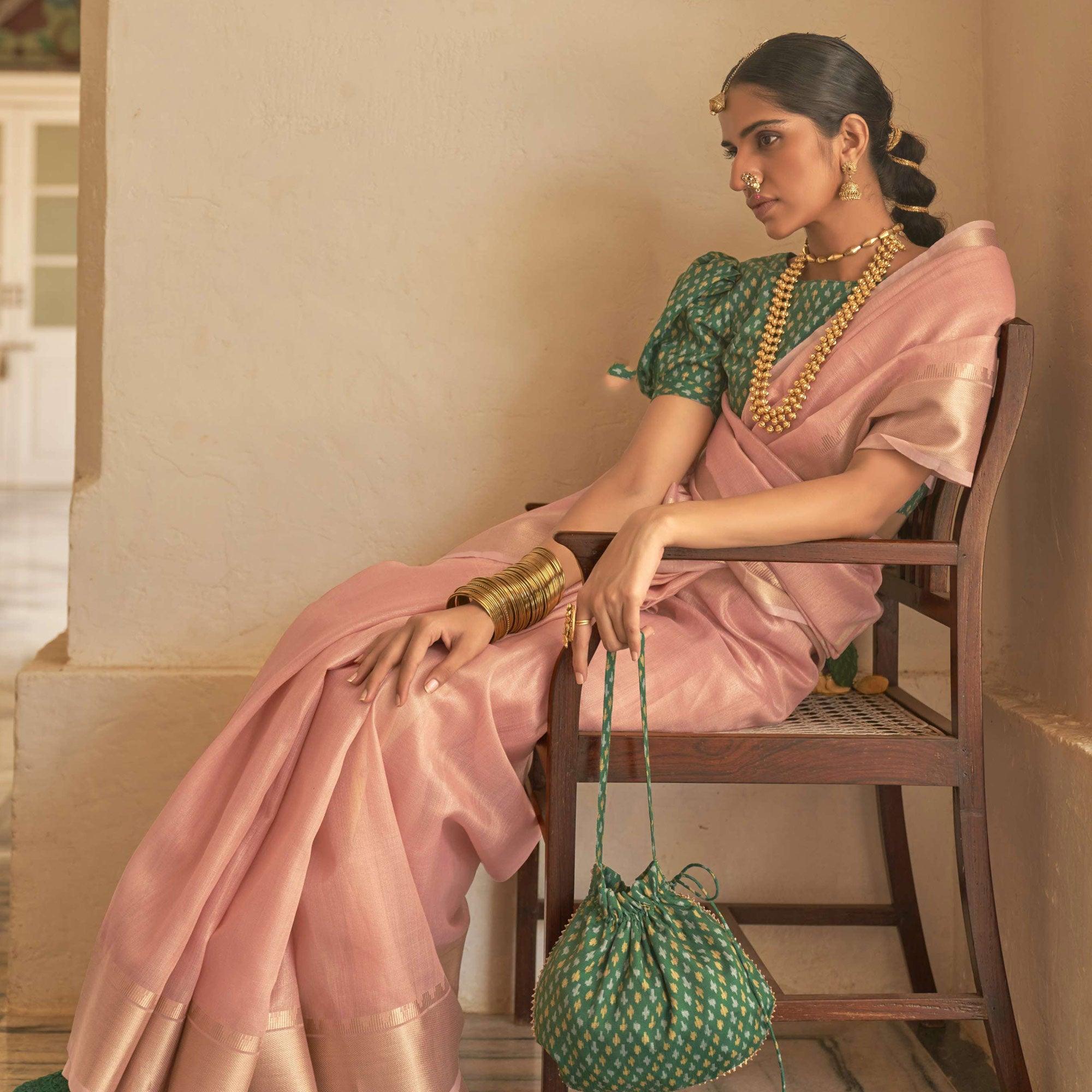 Pink Woven Organza Saree With Tassels - Peachmode