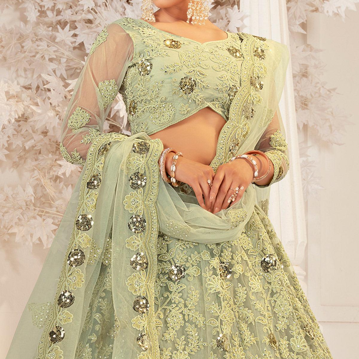 Pista Green Partywear Cording Embroidery With Embellished Net Lehenga Choli - Peachmode