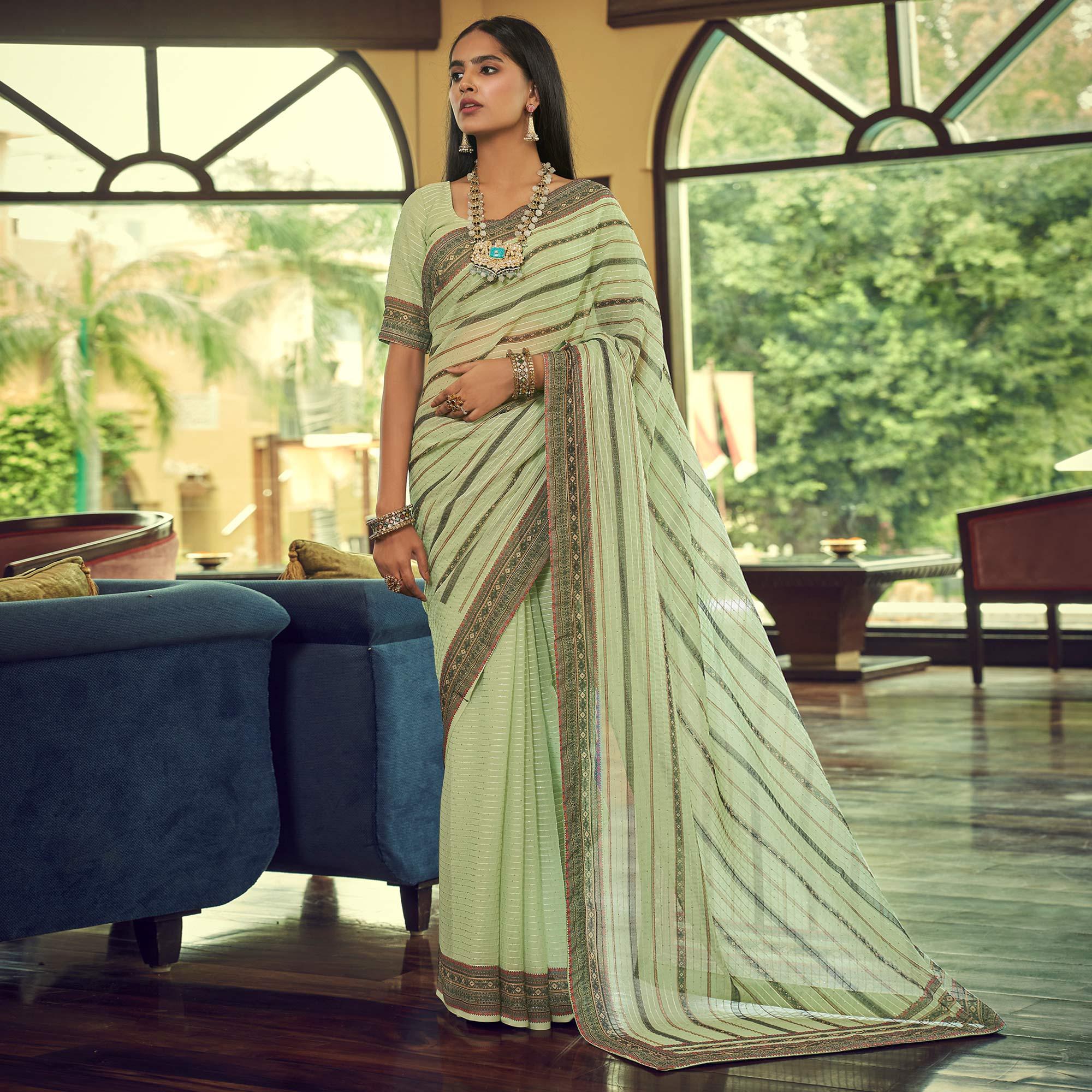 Pista Green Printed With Embellished Georgette Half and Half Saree - Peachmode