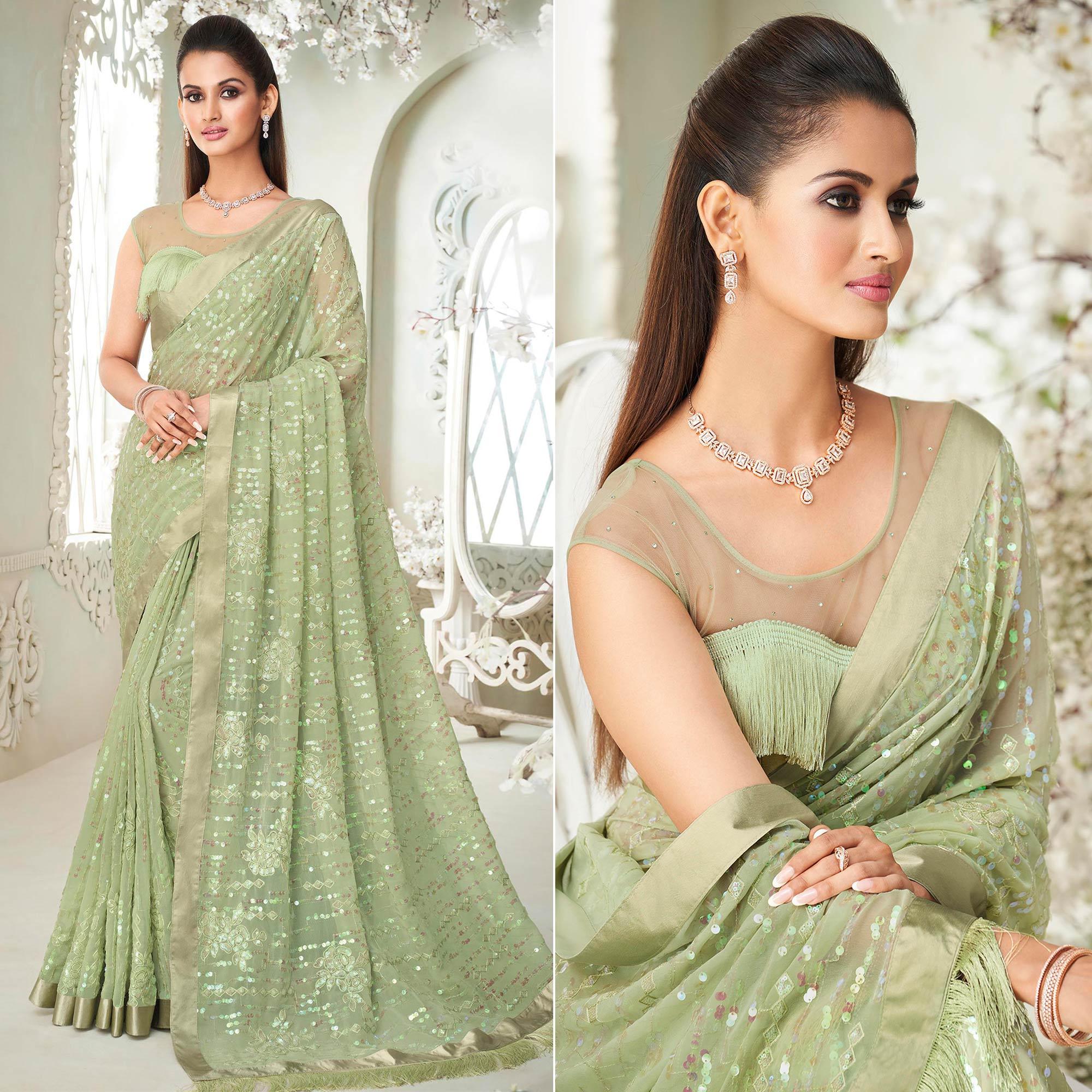 Pista Green Sequence Embroidered Georgette Saree With Tassels - Peachmode