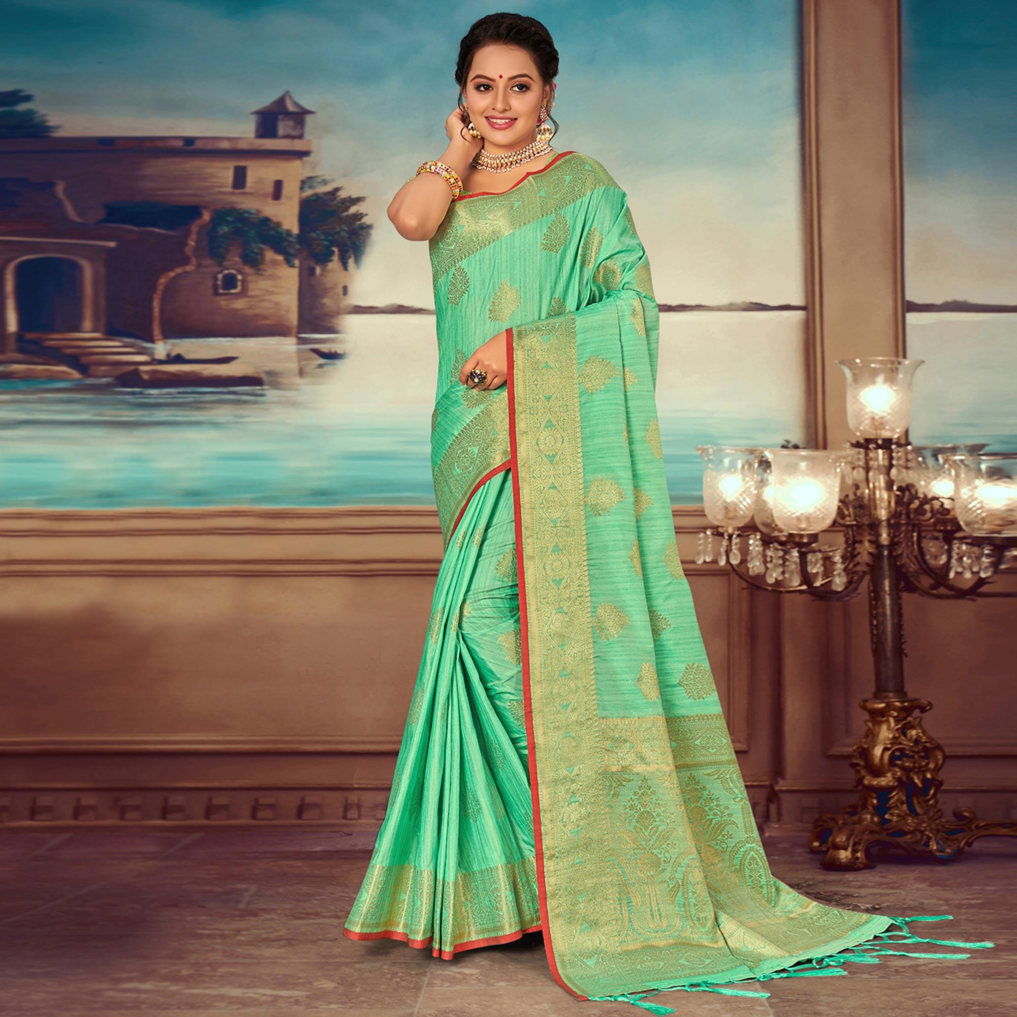 Pista Green Woven Banarasi Silk Saree With Tassels - Peachmode