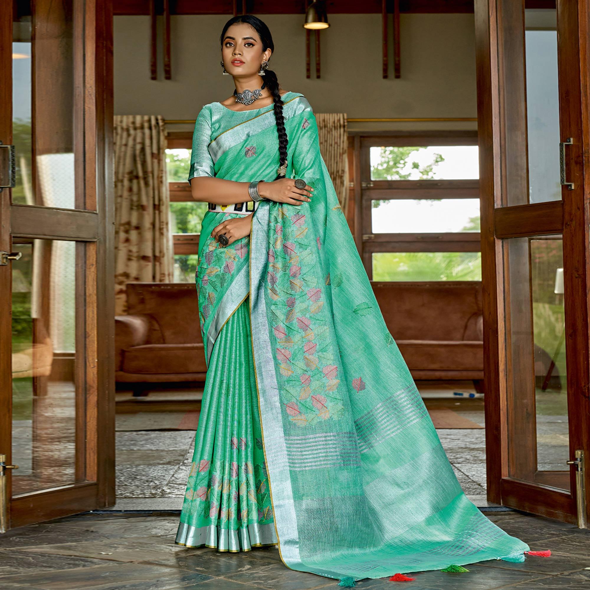 Pista Green Woven Linen Saree With Tassels - Peachmode