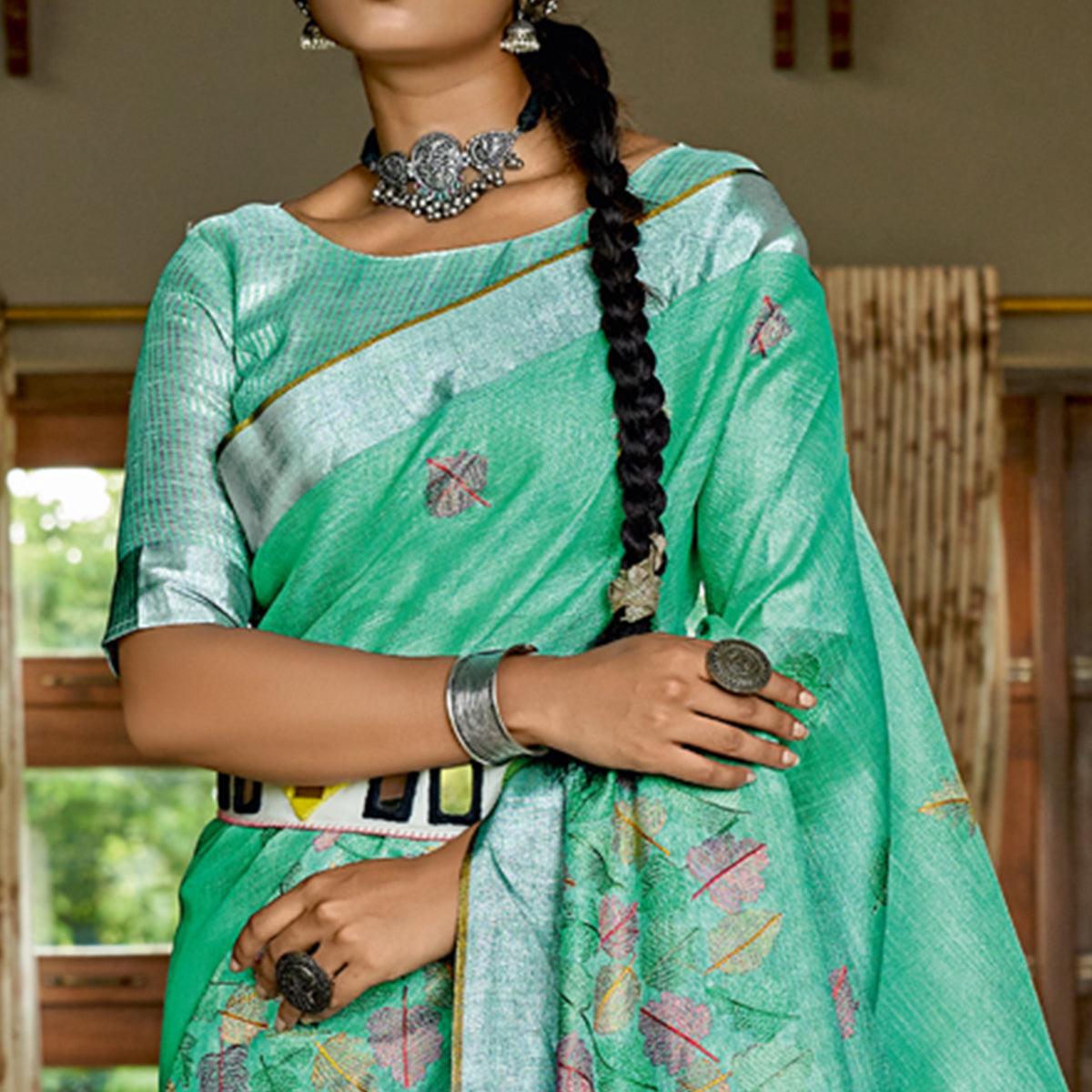 Pista Green Woven Linen Saree With Tassels - Peachmode