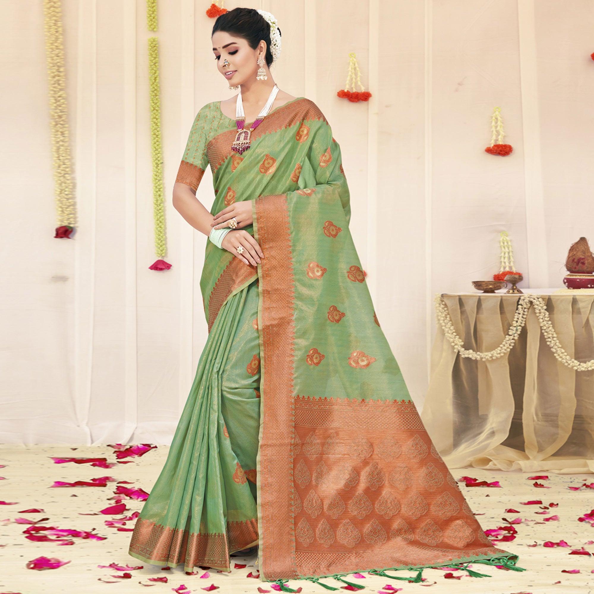 Pista Green Woven Organza Saree With Tassels - Peachmode