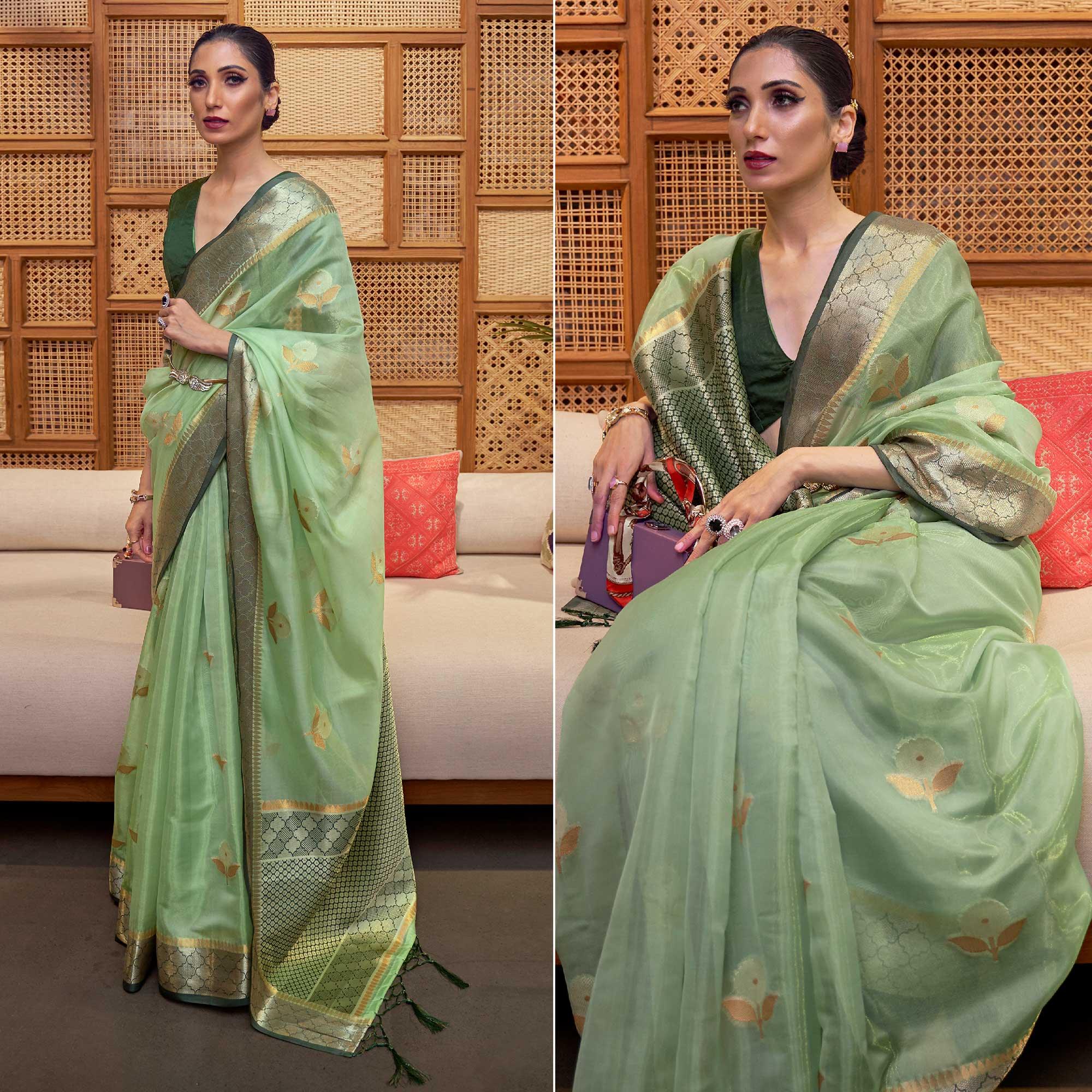 Pista Green Woven Organza Saree With Tassels - Peachmode