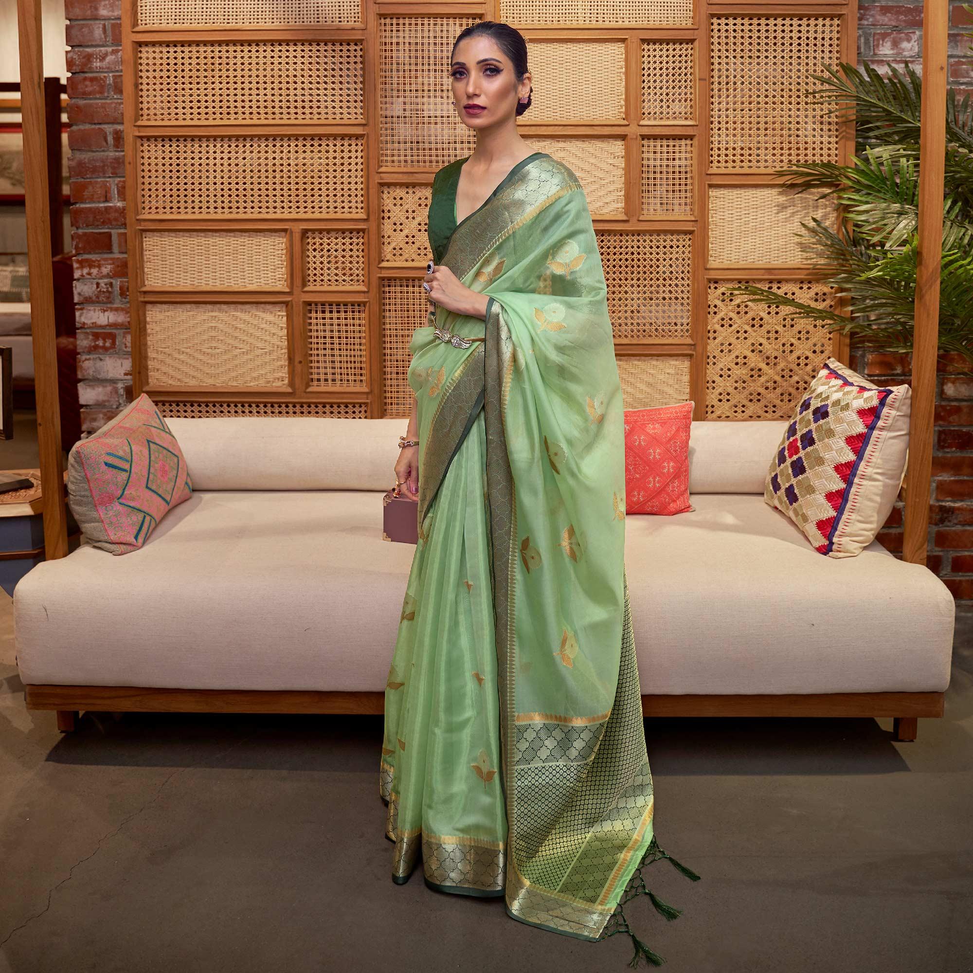 Pista Green Woven Organza Saree With Tassels - Peachmode