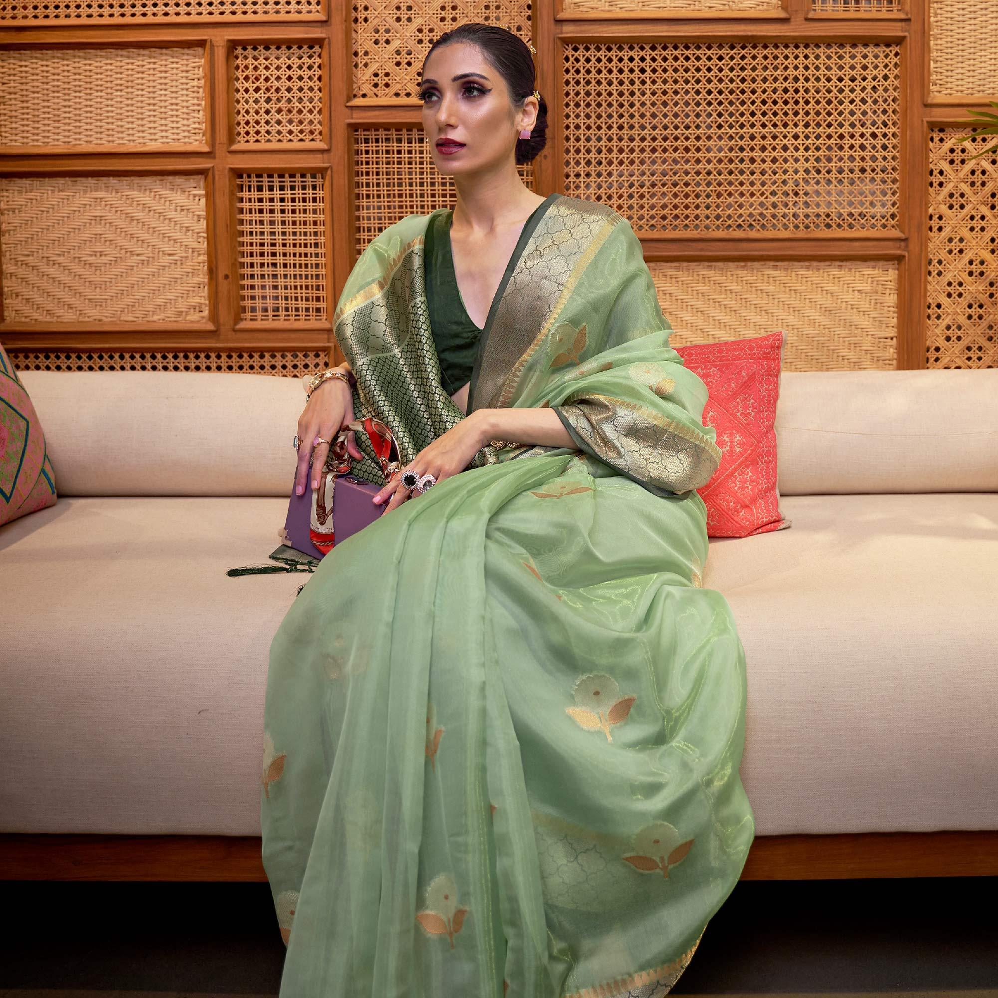 Pista Green Woven Organza Saree With Tassels - Peachmode