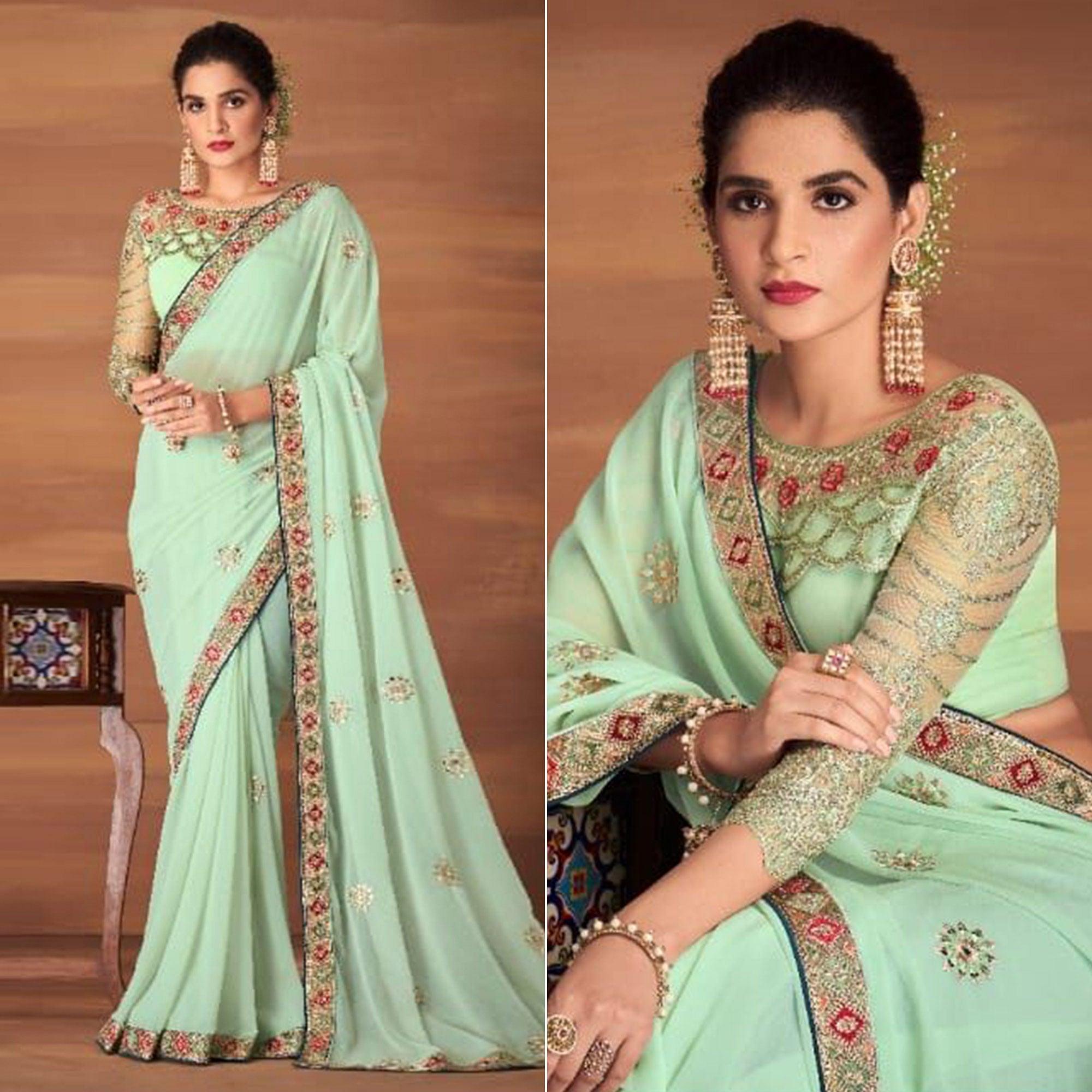 Pista Partywear Embroidered Georgette Saree - Peachmode