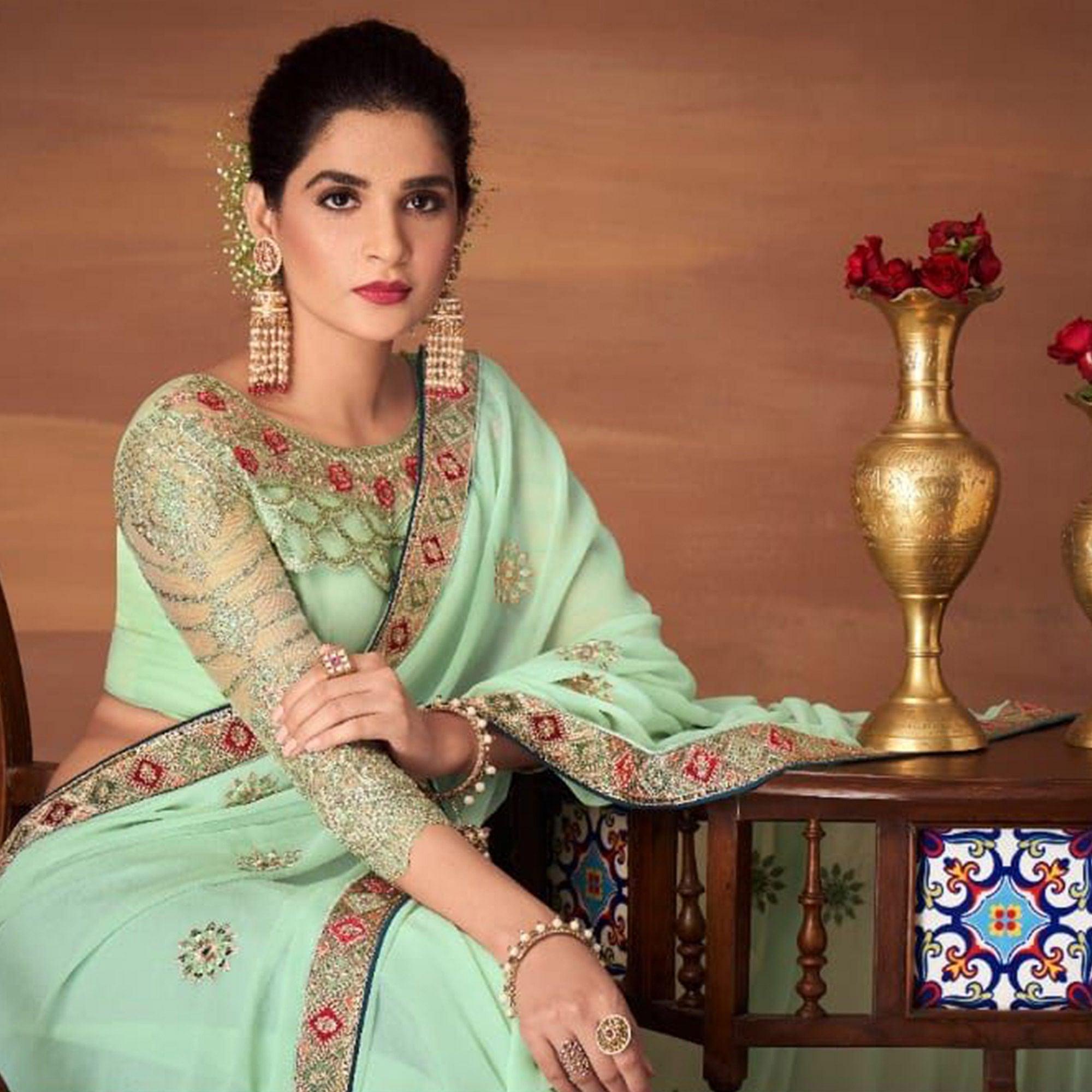 Pista Partywear Embroidered Georgette Saree - Peachmode