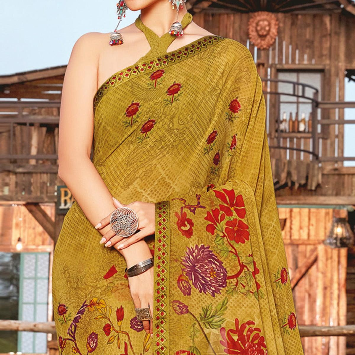 Pleasance Chikoo Coloured Partywear Pure Georgette Floral Printed Saree With Fancy Lace Border - Peachmode