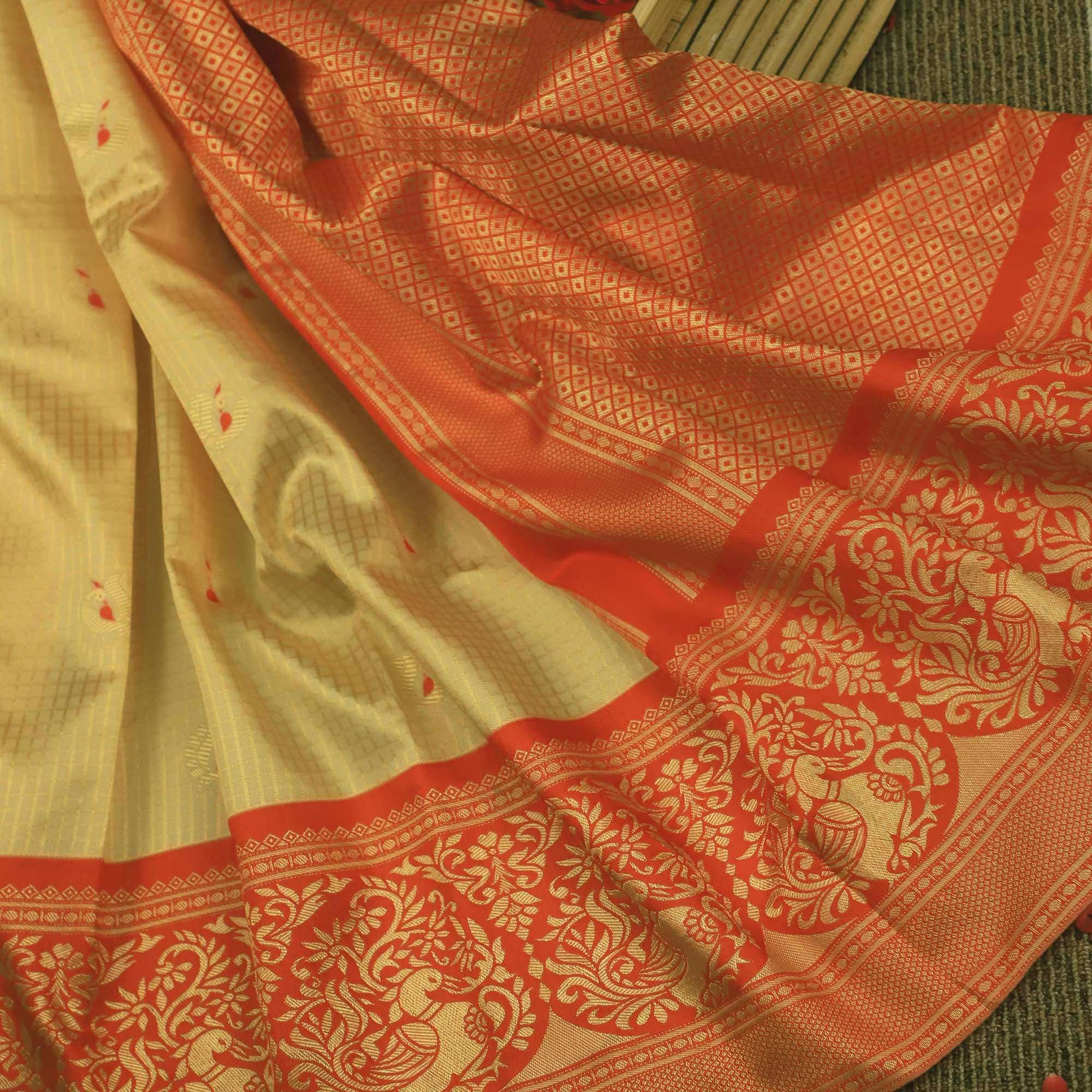 Pleasance Cream Colored Festive Wear Woven Soft Silk Saree - Peachmode