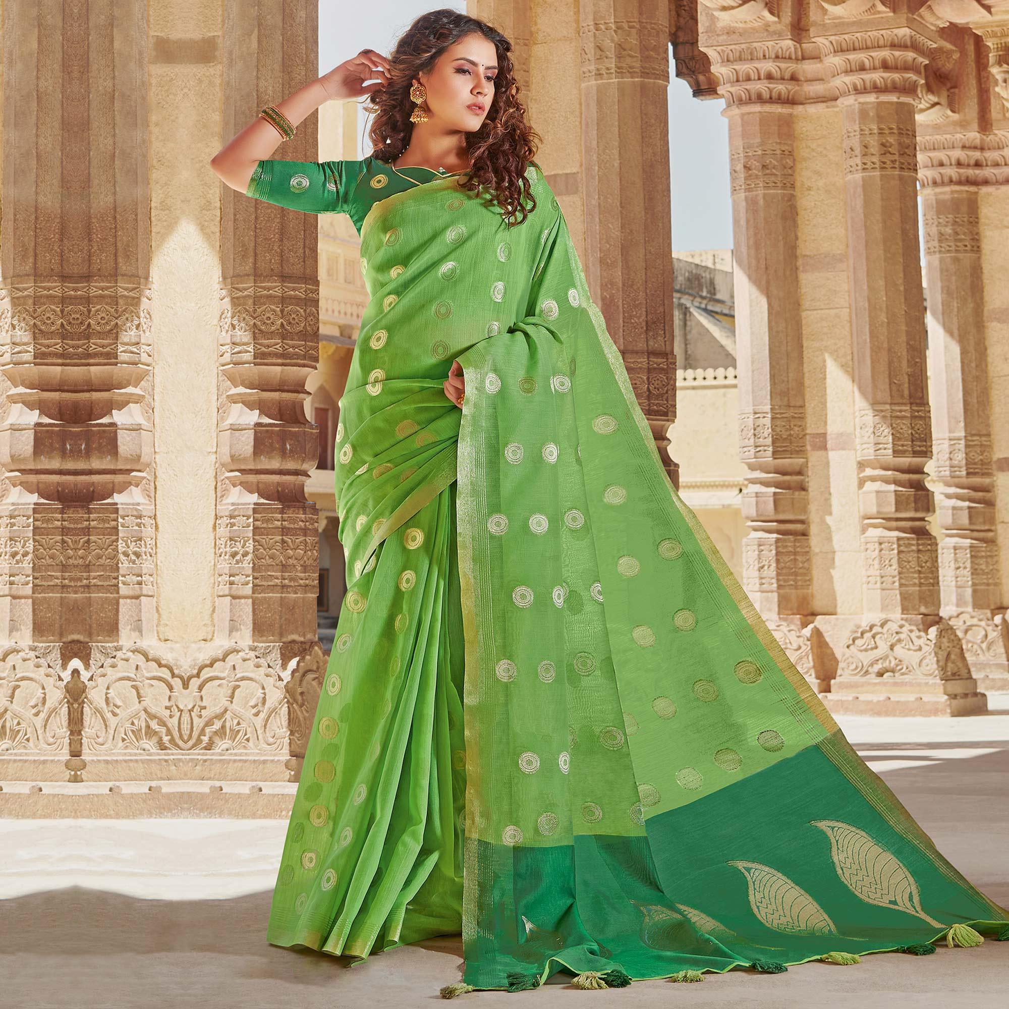 Pleasance Green Colored Festive Wear Woven Linen Cotton Saree With Tassels - Peachmode