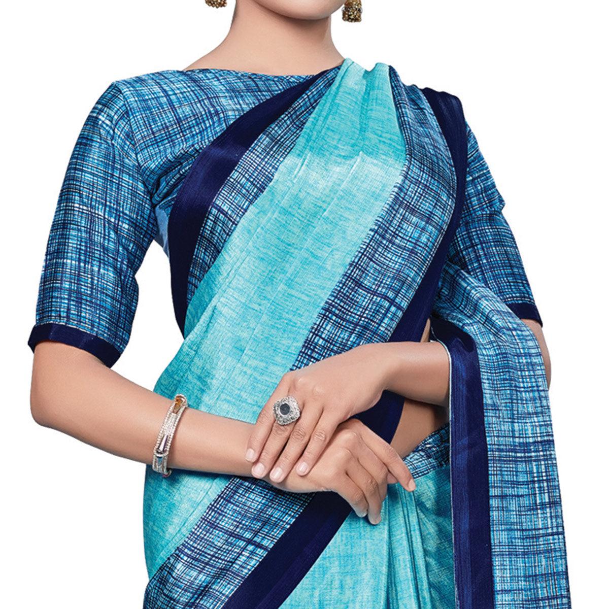 Pleasant Blue Colored Casual Wear Printed Crepe Saree - Peachmode
