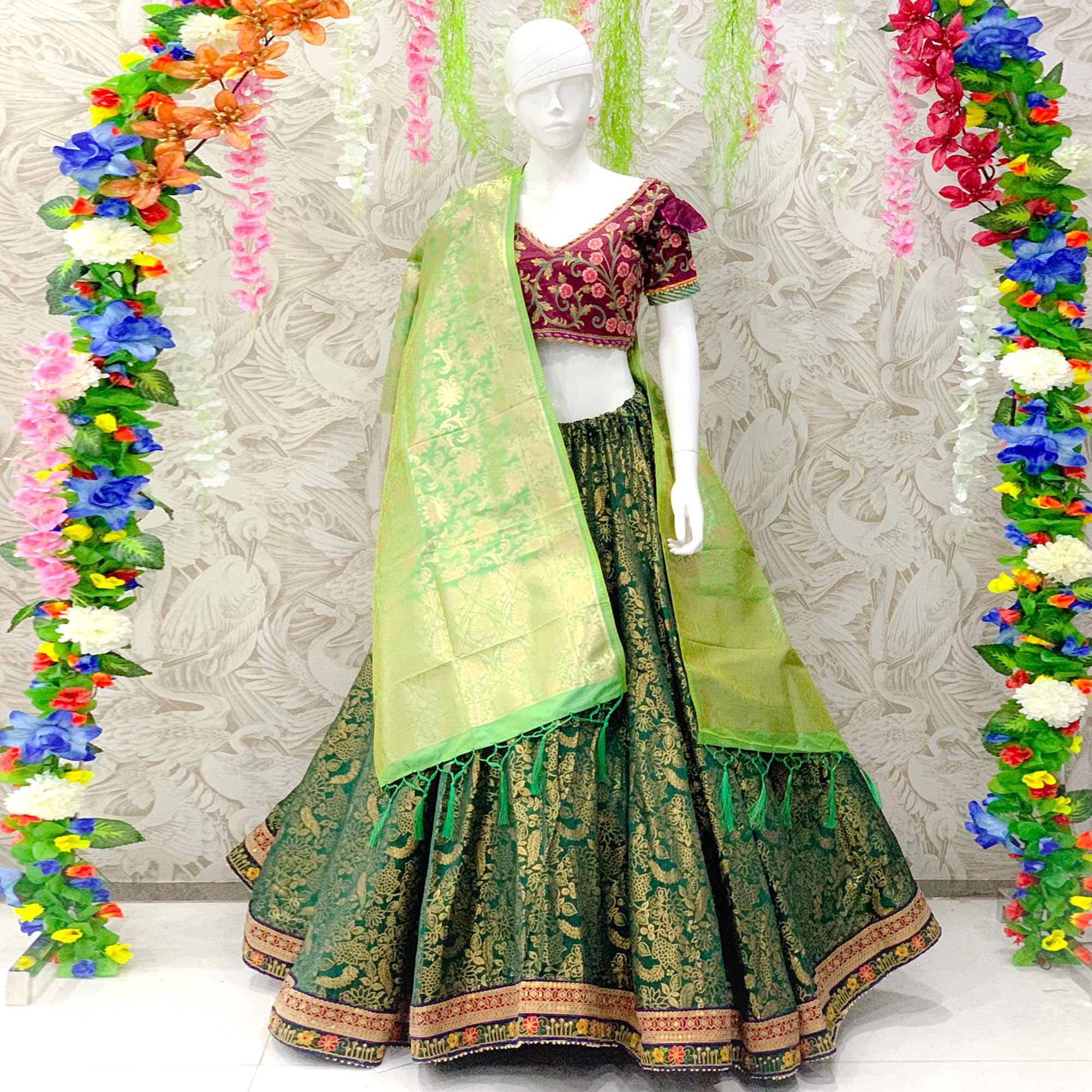 Pleasant Bottle Green Colored Designer Wedding Wear Woven Banarasi Silk Lehenga Choli - Peachmode