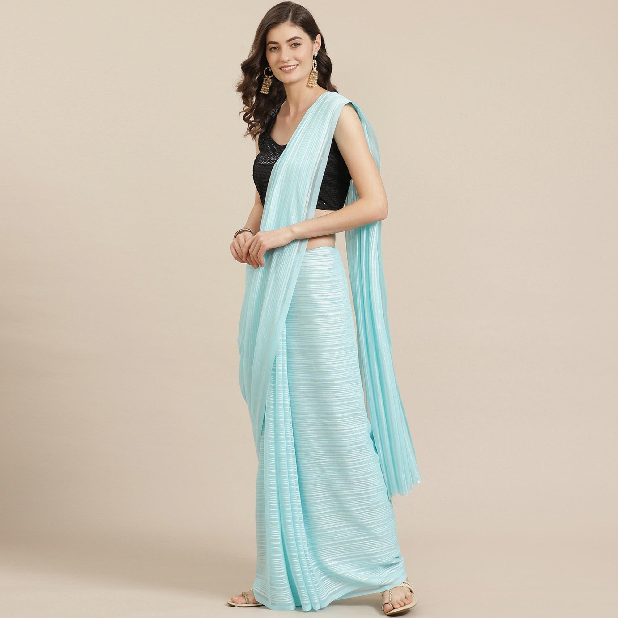 Pleasant Light Blue Coloured Partywear Printed Georgette Saree - Peachmode