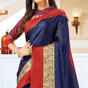 Pleasant Navy Blue Colored Festive Wear Woven Handloom Silk Saree - Peachmode