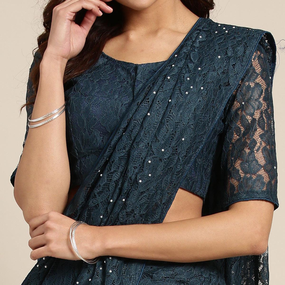 Pleasant Teal Green Colored Partywear Netted Saree - Peachmode