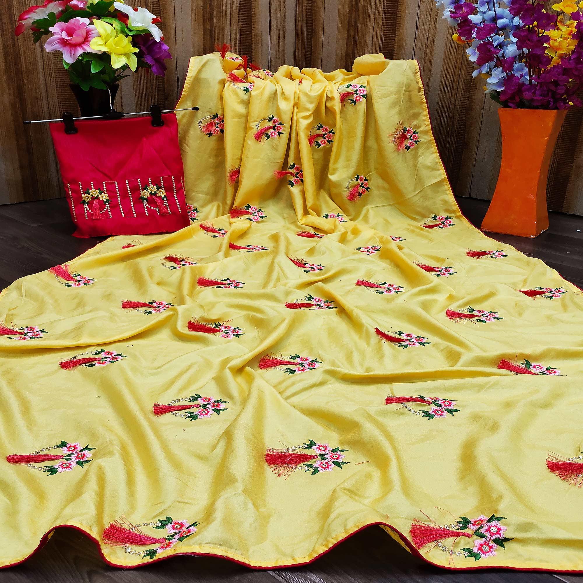 Pleasant Yellow Colored Partywear Embroidered Dola Silk Saree - Peachmode