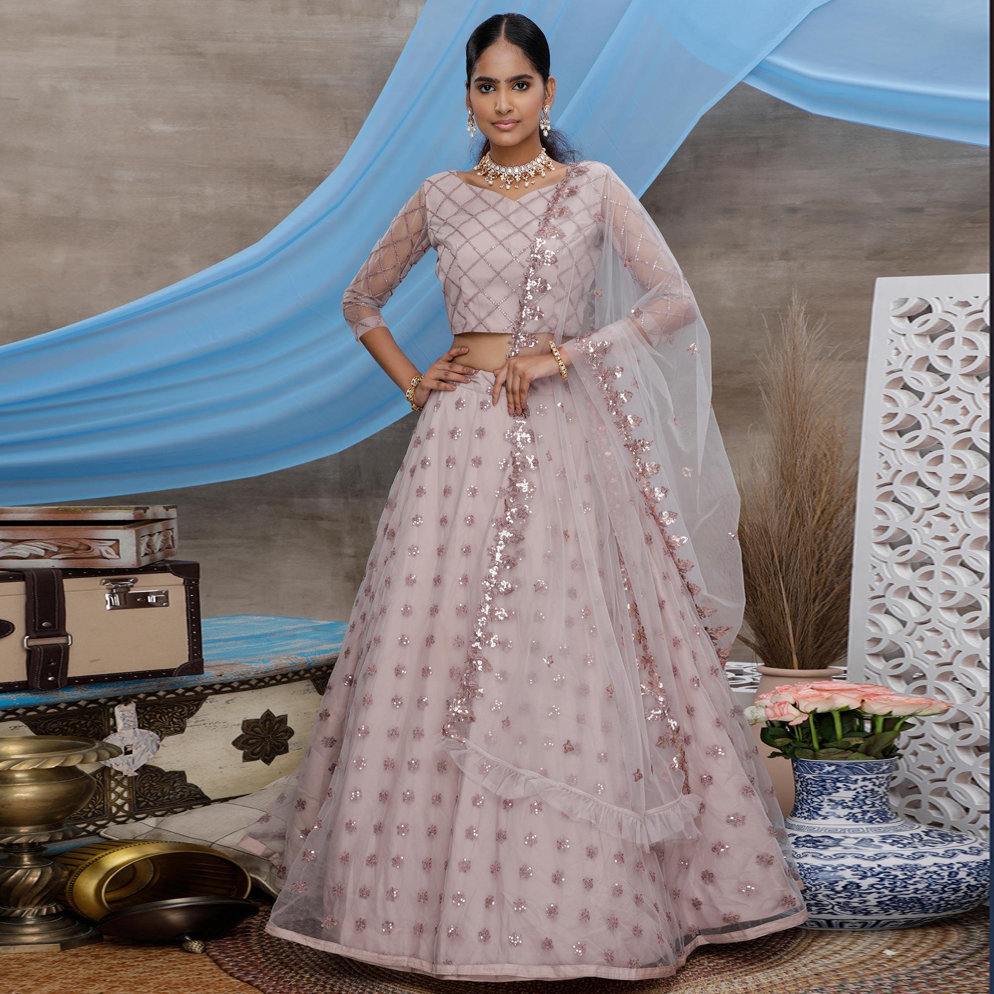 Preferable Dusty Purple Colored Designer Partywear Embroidered Net Lehenga Choli - Peachmode