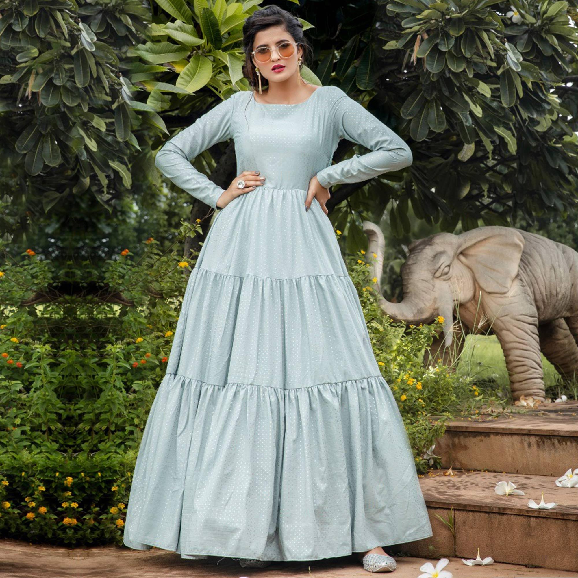 Preferable Dusty Sky Blue Colored Party Wear Foil Printed Silk Blend Gown - Peachmode