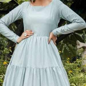 Preferable Dusty Sky Blue Colored Party Wear Foil Printed Silk Blend Gown - Peachmode