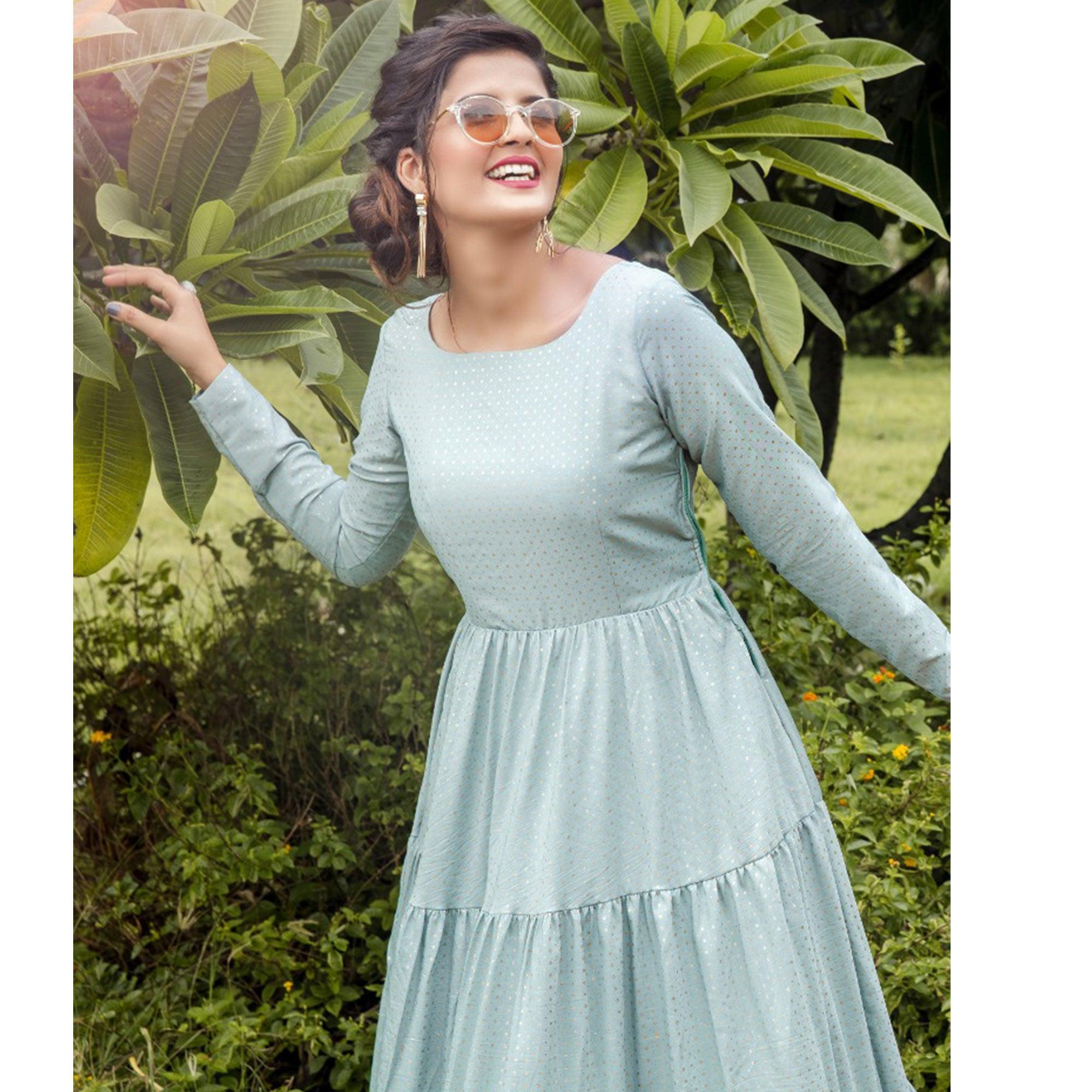 Preferable Dusty Sky Blue Colored Party Wear Foil Printed Silk Blend Gown - Peachmode