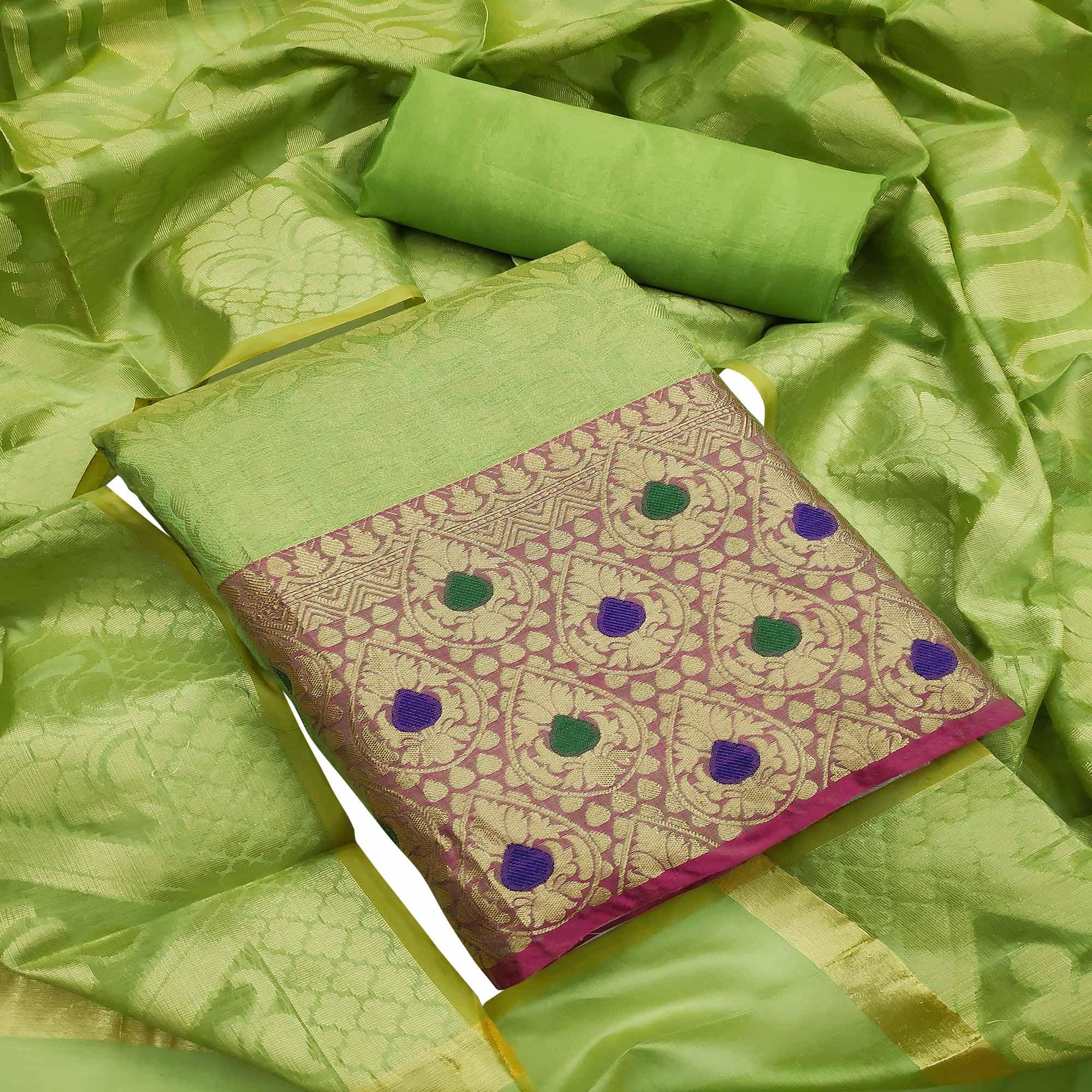 Preferable Green Colored Festive Wear Woven Heavy Banarasi Silk Dress Material - Peachmode