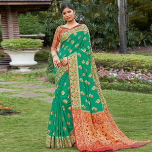 Preferable Green Colored Festive Wear Woven Heavy Banarasi Silk Sareee - Peachmode