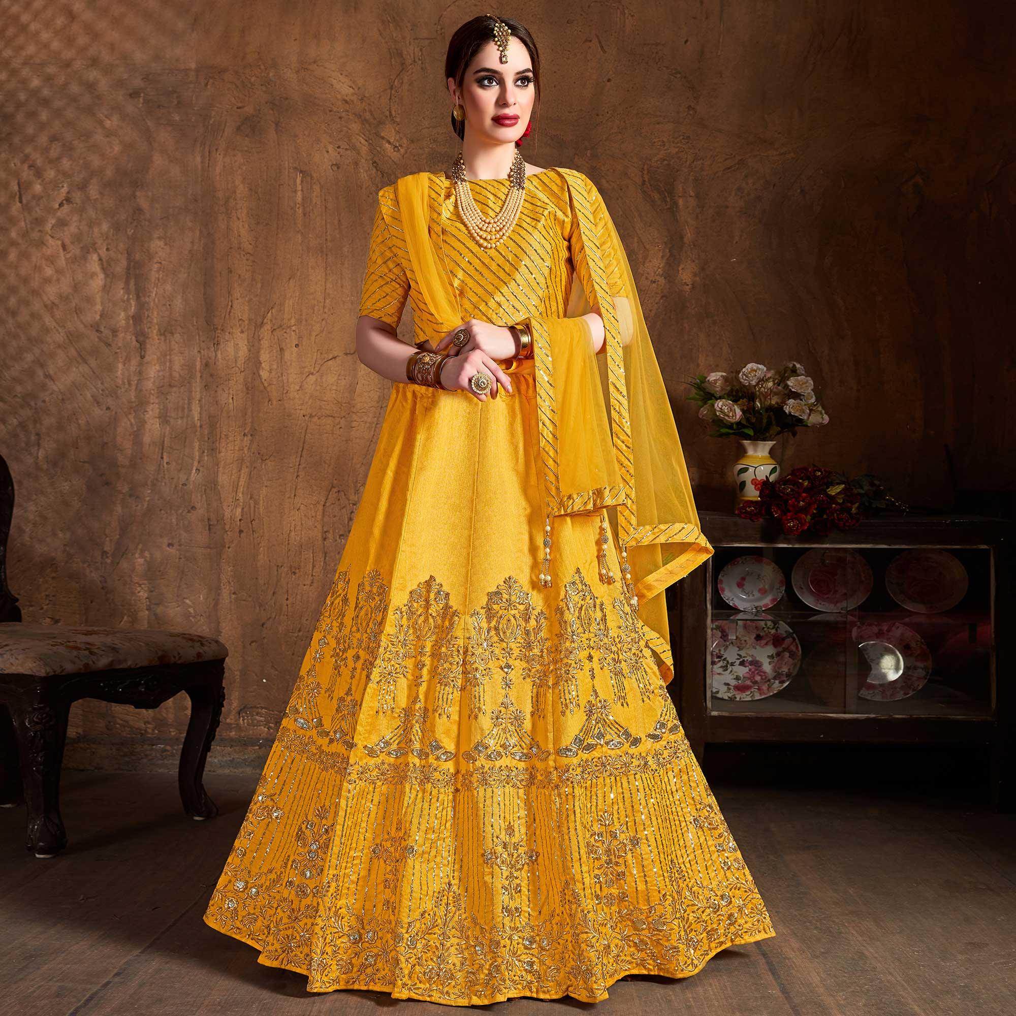Preferable Yellow Colored Partywear Embroidered Banglori Silk Lehenga - Peachmode