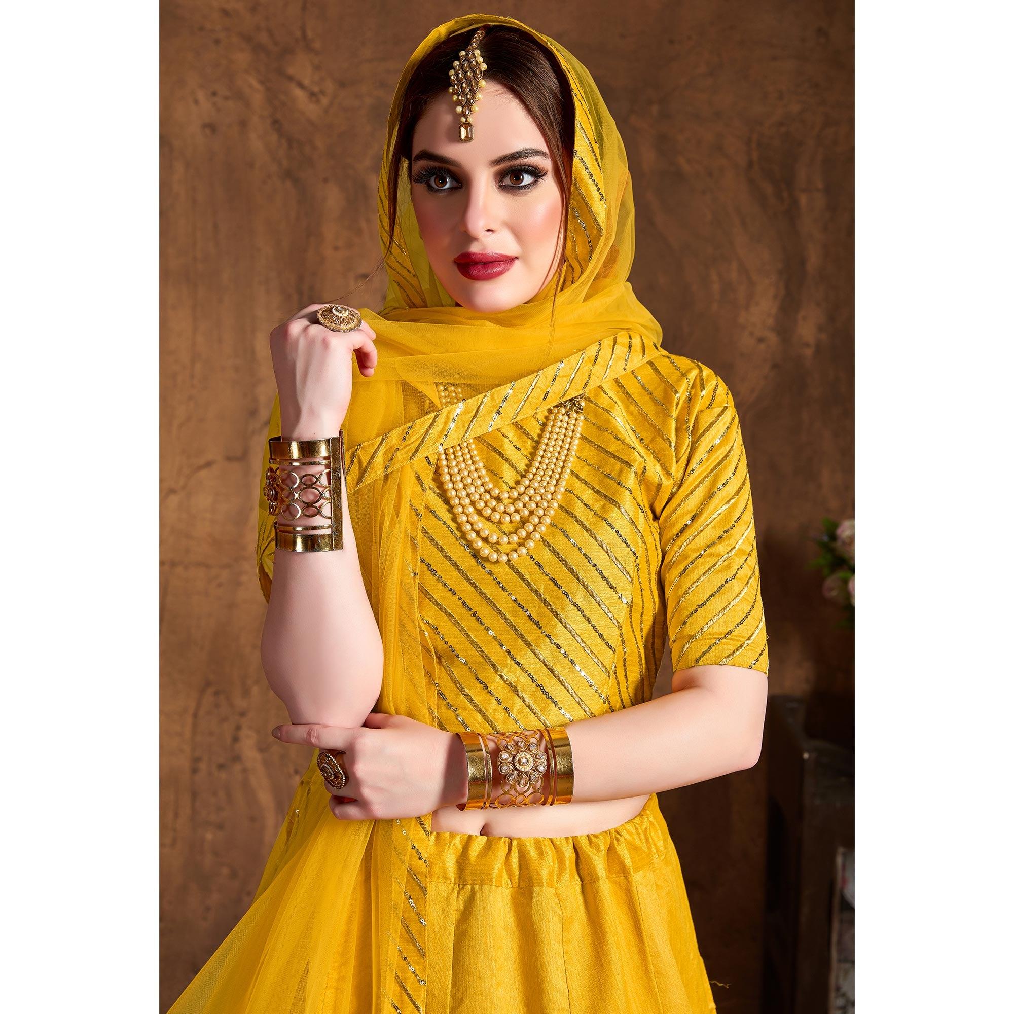 Preferable Yellow Colored Partywear Embroidered Banglori Silk Lehenga - Peachmode