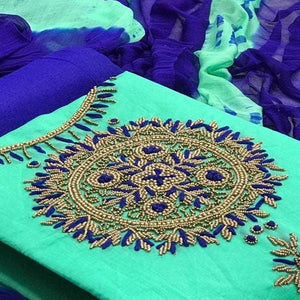 Pretty Light Rama Colored Partywear Embroidered Modal Dress Material - Peachmode