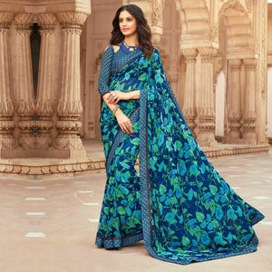 Prominent Blue Colored Casual Floral Printed Georgette Saree - Peachmode