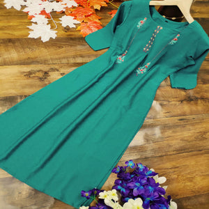 Prominent Dark Green Colored Party Wear Embroidered Cotton Kurti - Peachmode