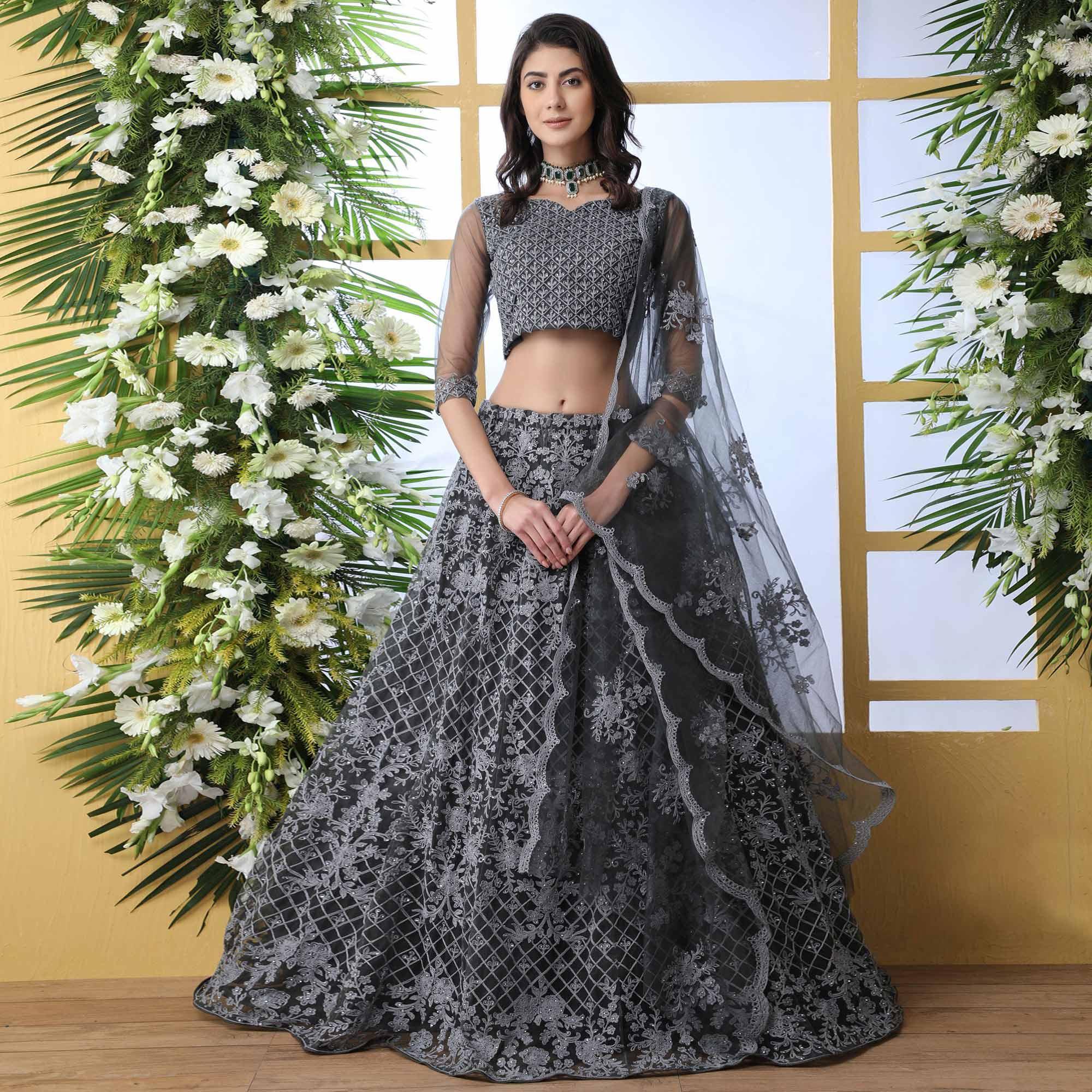 Prominent Grey Colored Partywear Embroidered Netted Lehenga Choli - Peachmode