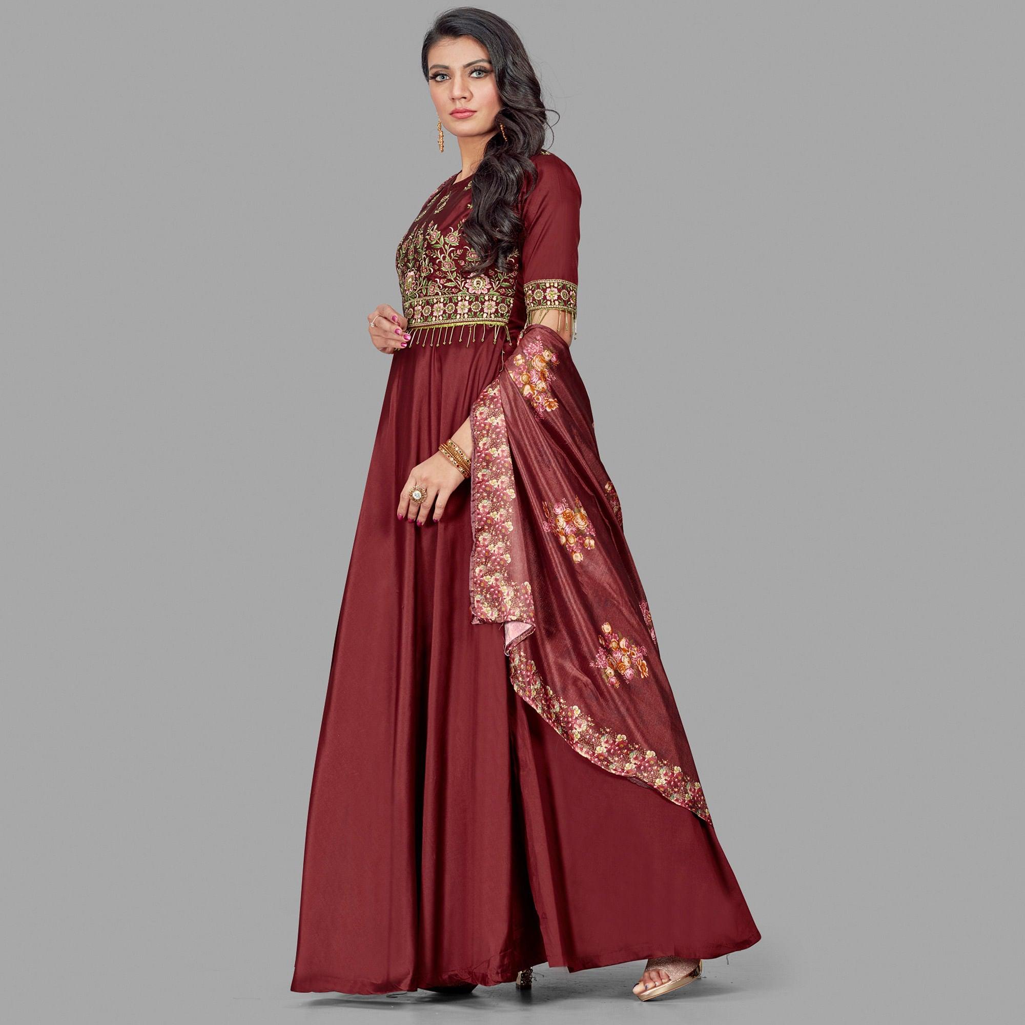 Prominent Maroon Coloured Embroidered Party Wear Floral Taffeta Gown - Peachmode
