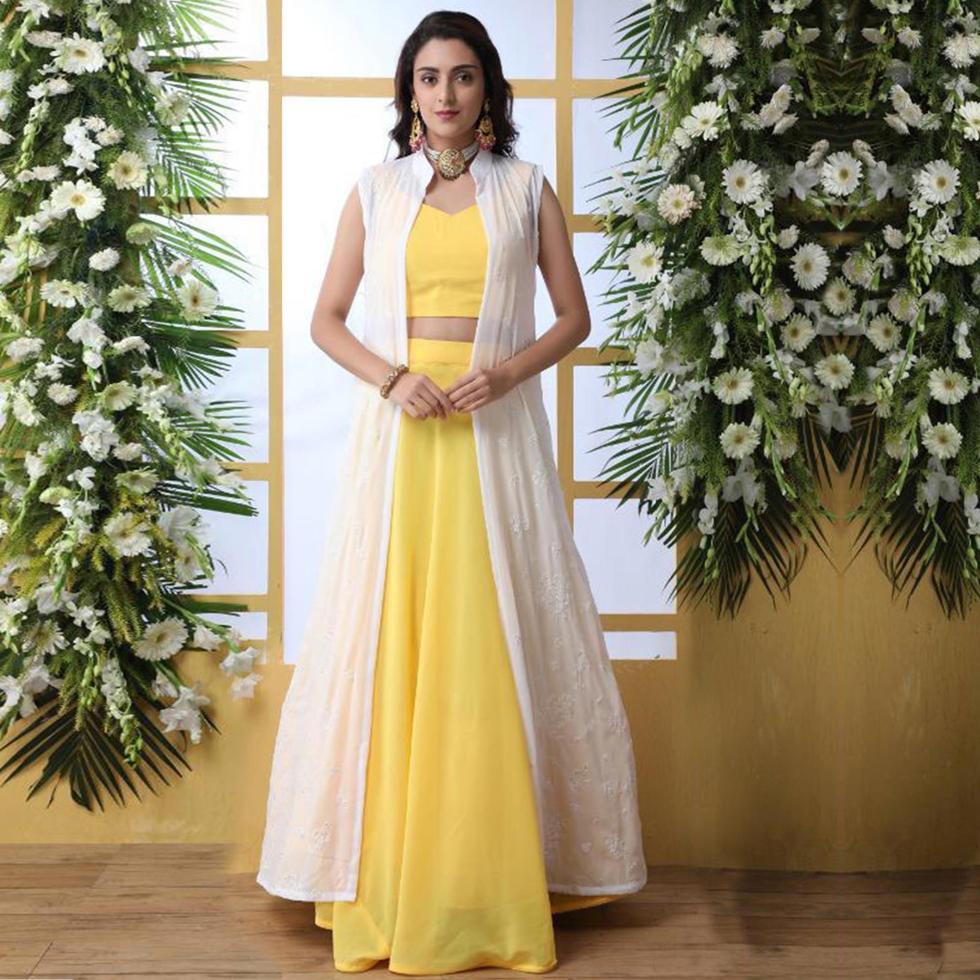 Prominent Yellow Colored Party Wear Solid Georgette Lehenga Choli With Koti - Peachmode