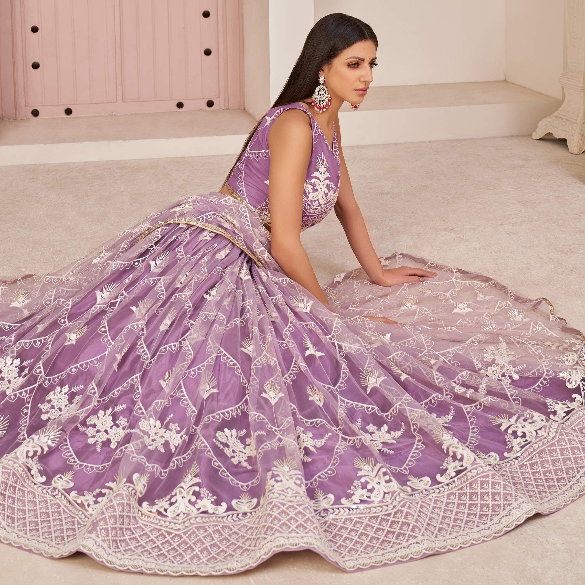 Purple Party Wear Embroidered Netted Lehenga Choli - Peachmode