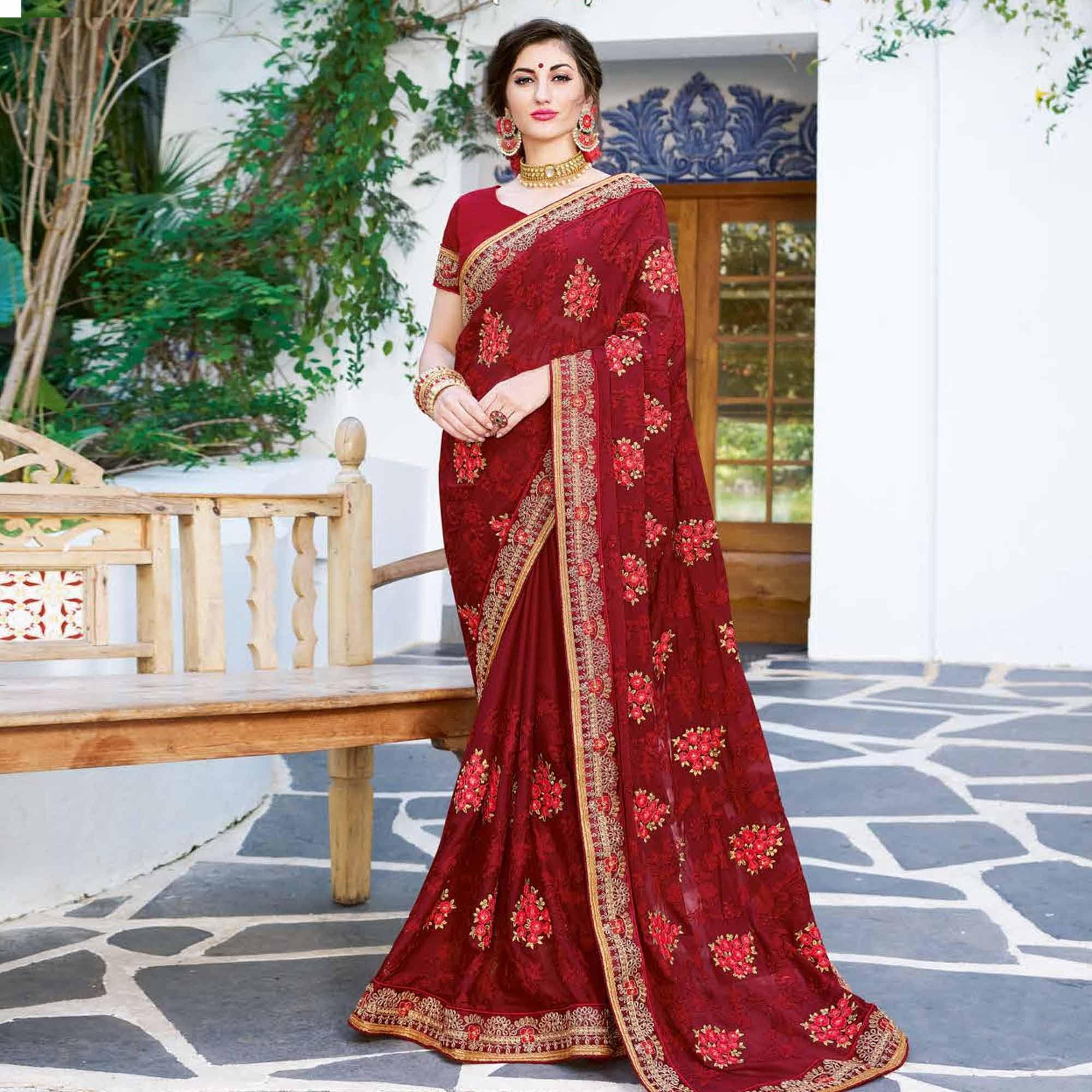 Radiant Maroon Colored Partywear Embroidered Georgette Silk Saree - Peachmode