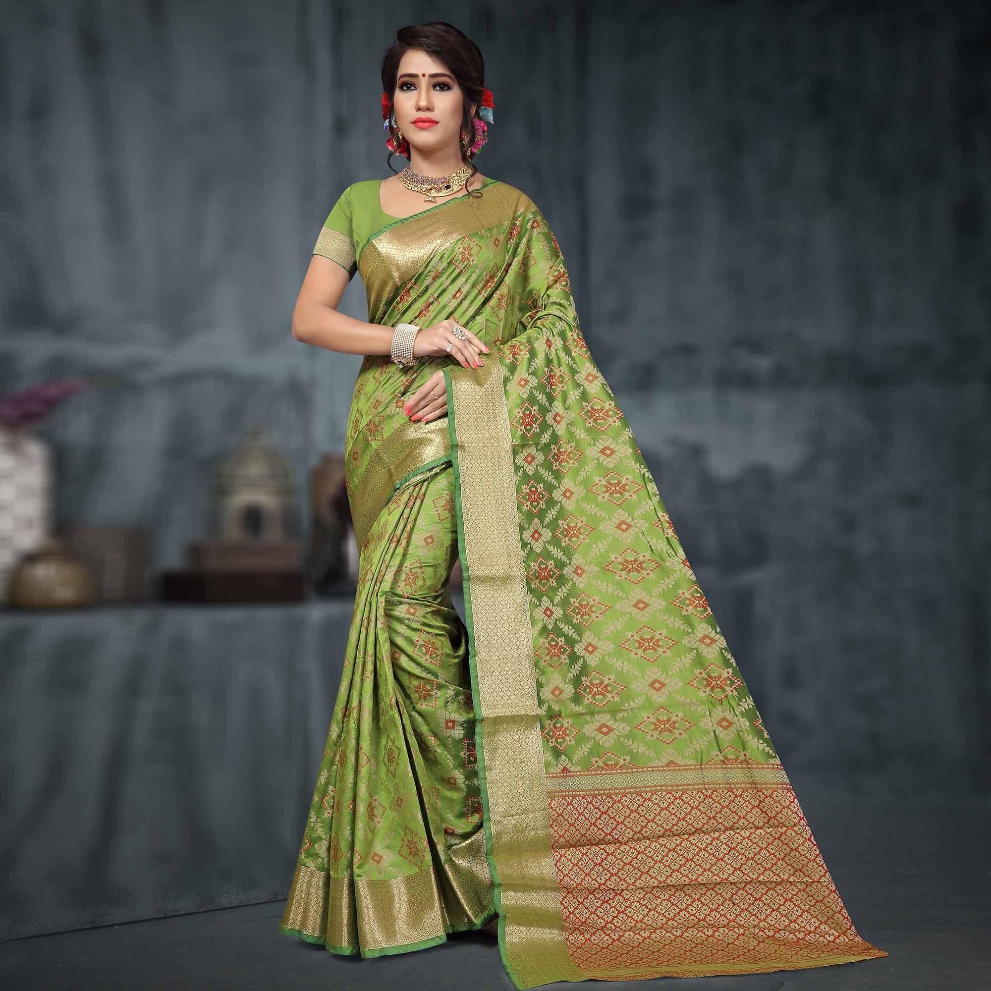 Radiant Pista Green Colored Festive Wear Woven Silk Saree - Peachmode