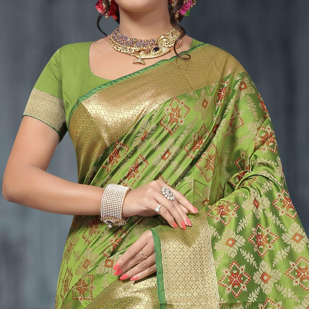 Radiant Pista Green Colored Festive Wear Woven Silk Saree - Peachmode