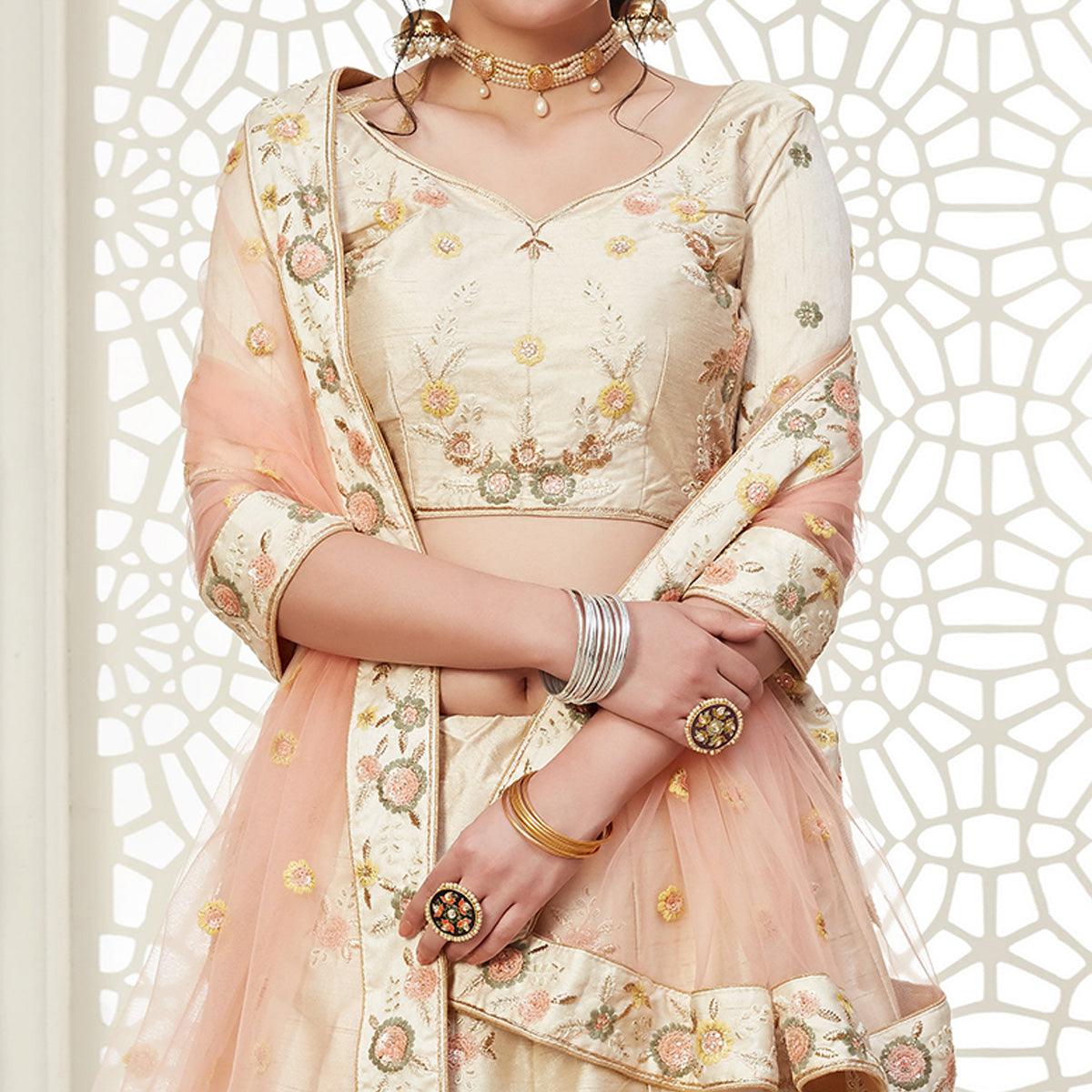 Ravishing Cream Colored Cording Thread & Sequence Embroidery Designer Wedding Wear Net With Mulberry Silk Lehenga Choli - Peachmode