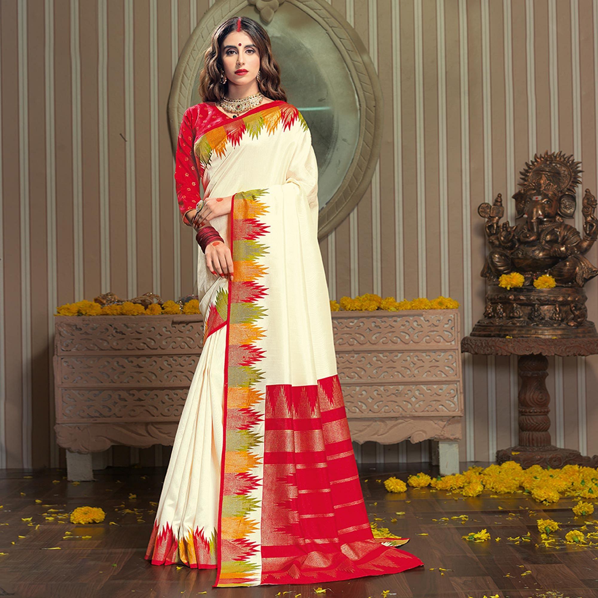 Ravishing Cream Colored Festive Wear Patola Silk saree - Peachmode