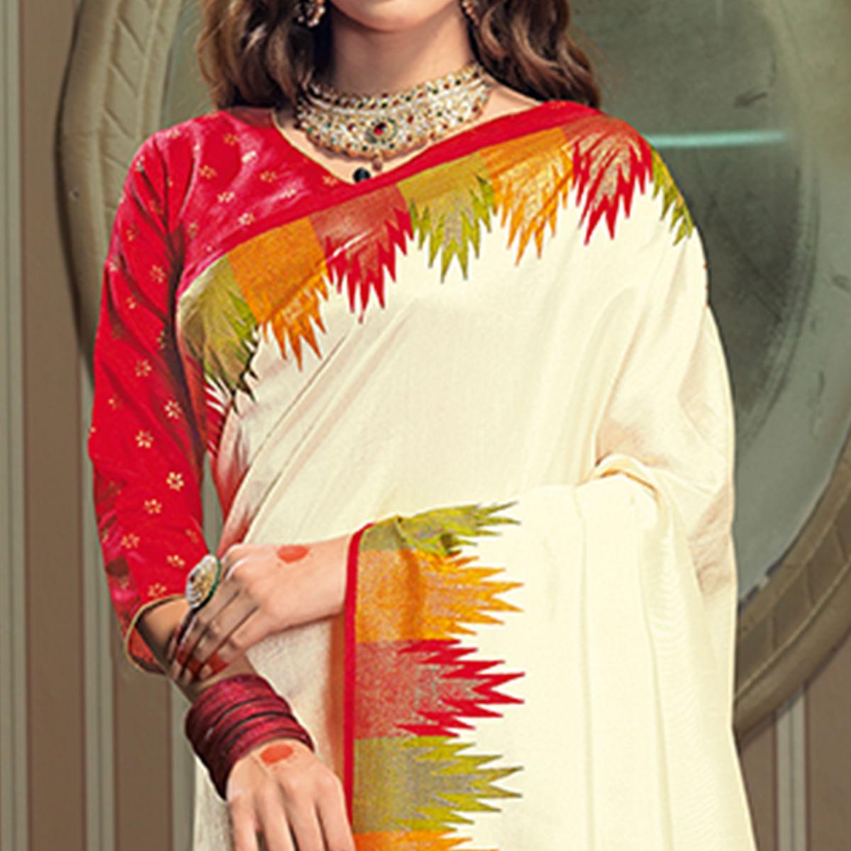 Ravishing Cream Colored Festive Wear Patola Silk saree - Peachmode