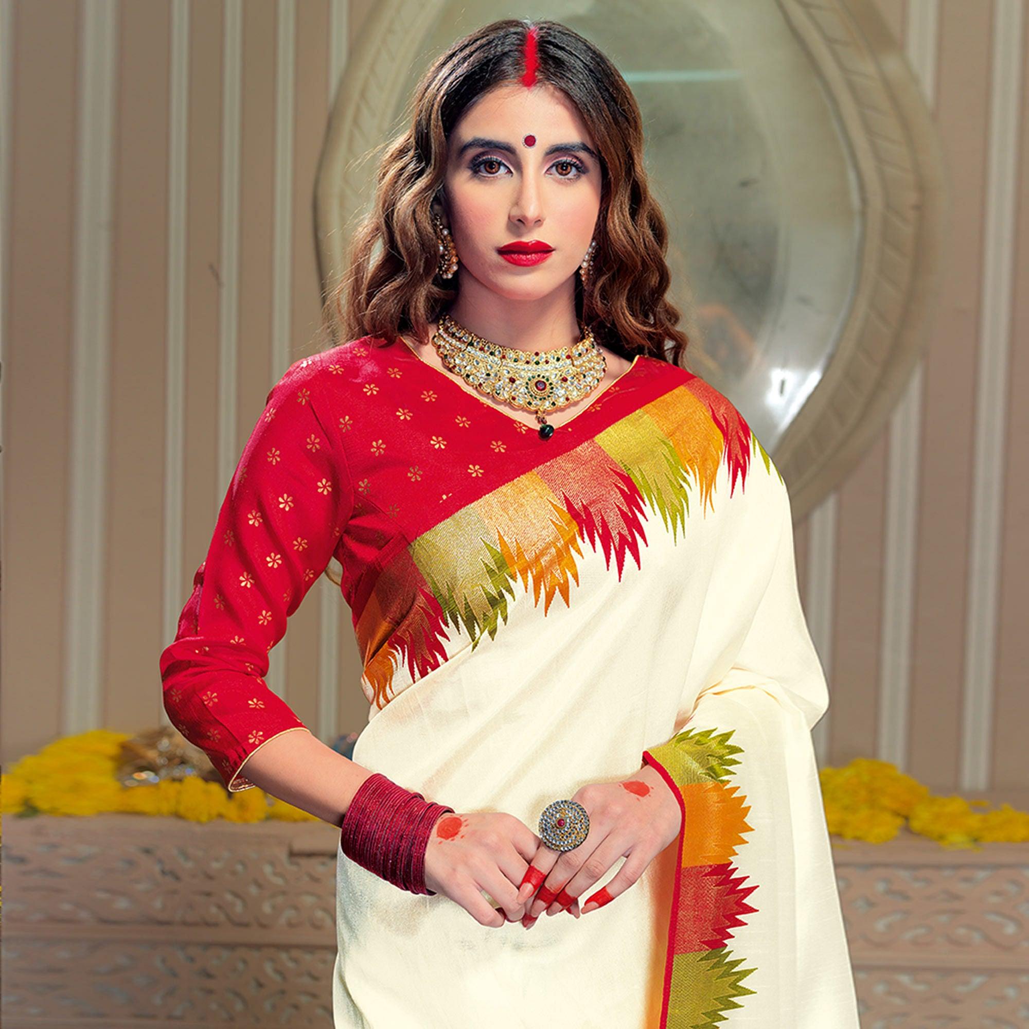 Ravishing Cream Colored Festive Wear Patola Silk saree - Peachmode