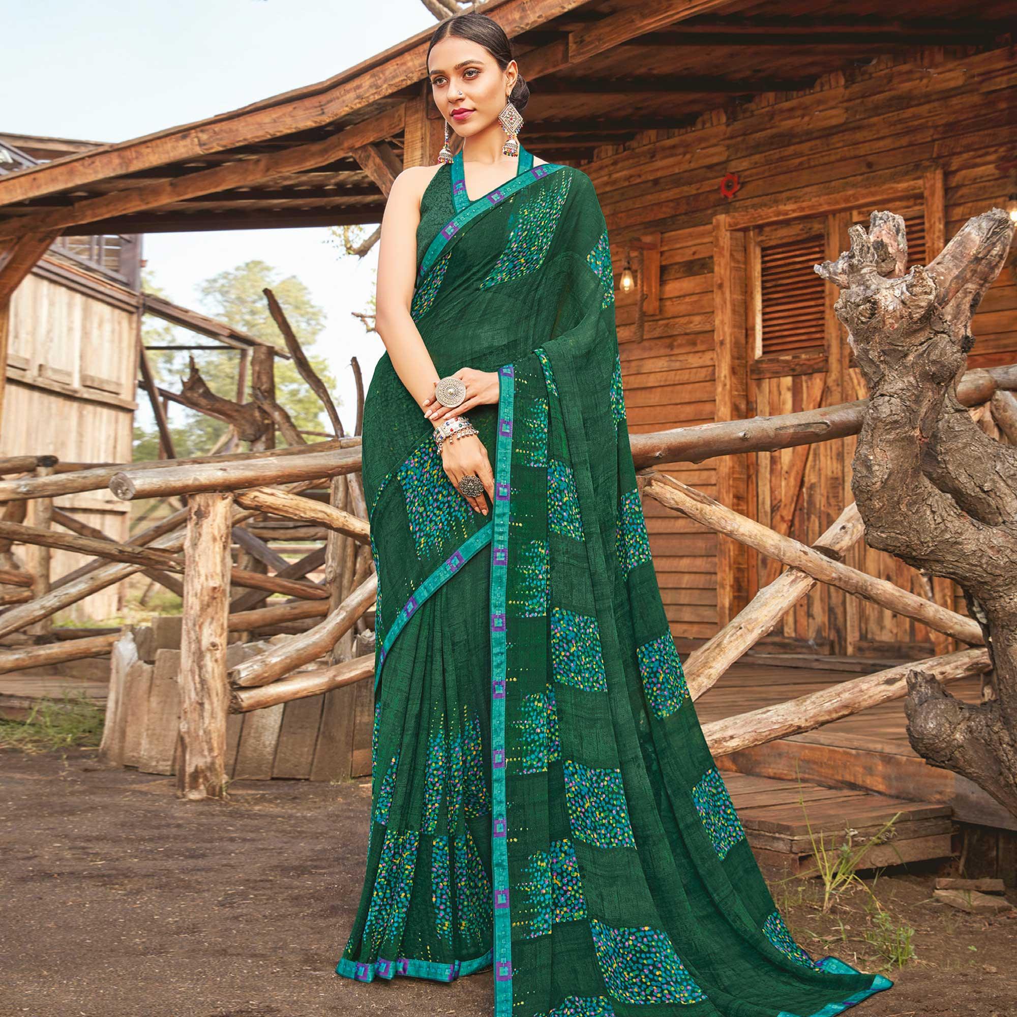Ravishing Dark Green Coloured Partywear Pure Georgette Floral Printed Saree With Fancy Lace Border - Peachmode