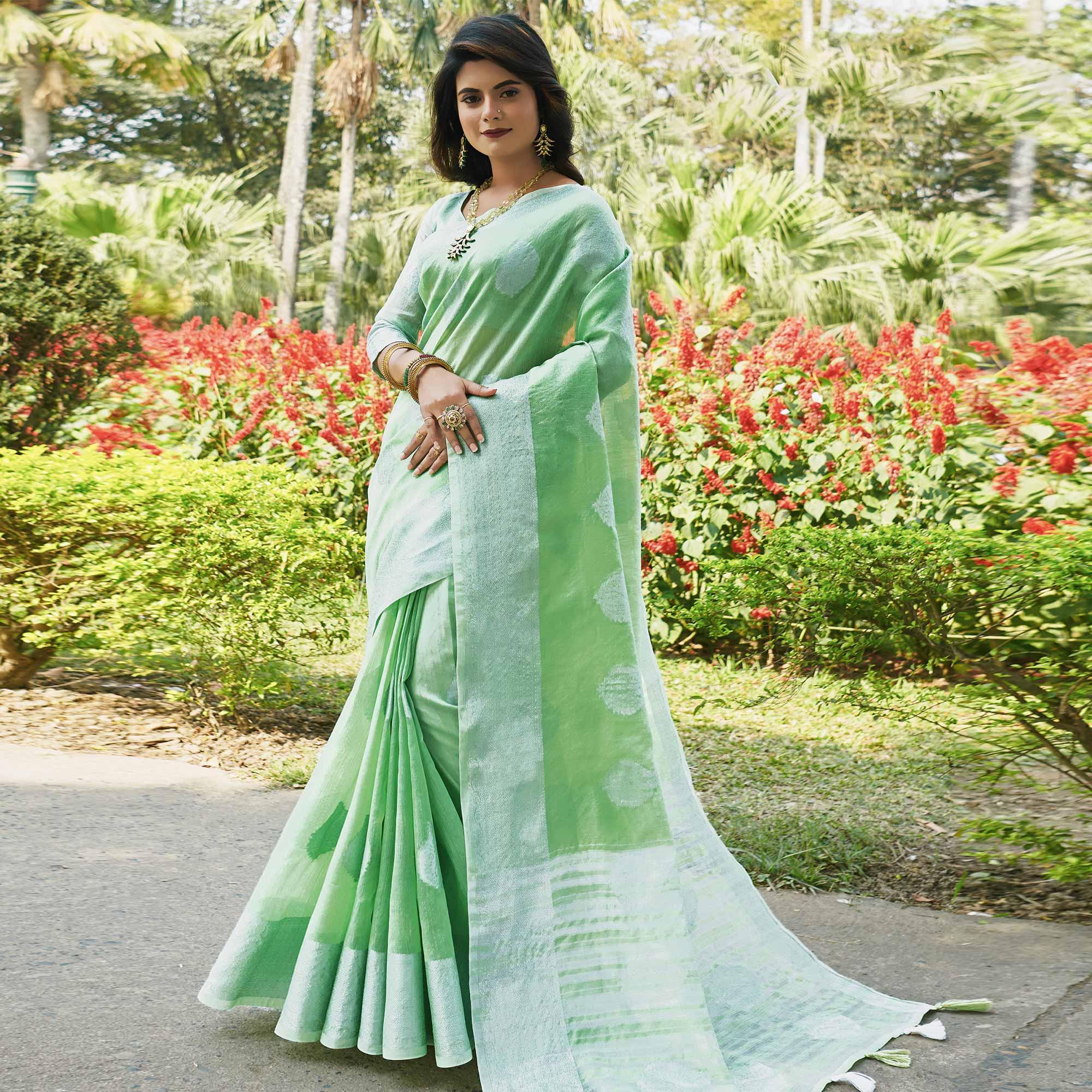 Ravishing Green Colored Festive Wear Woven Linen Cotton Saree - Peachmode