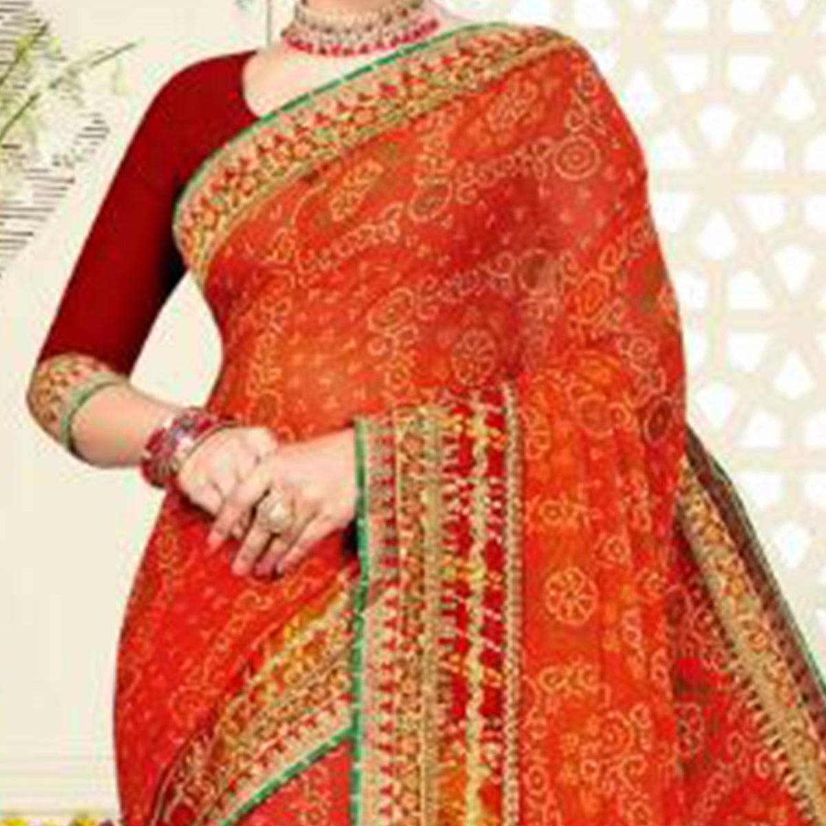 Ravishing Orange Colored Festive Wear Bandhani Print With Zari Border Work And Latkan Heavy Georgette Saree - Peachmode